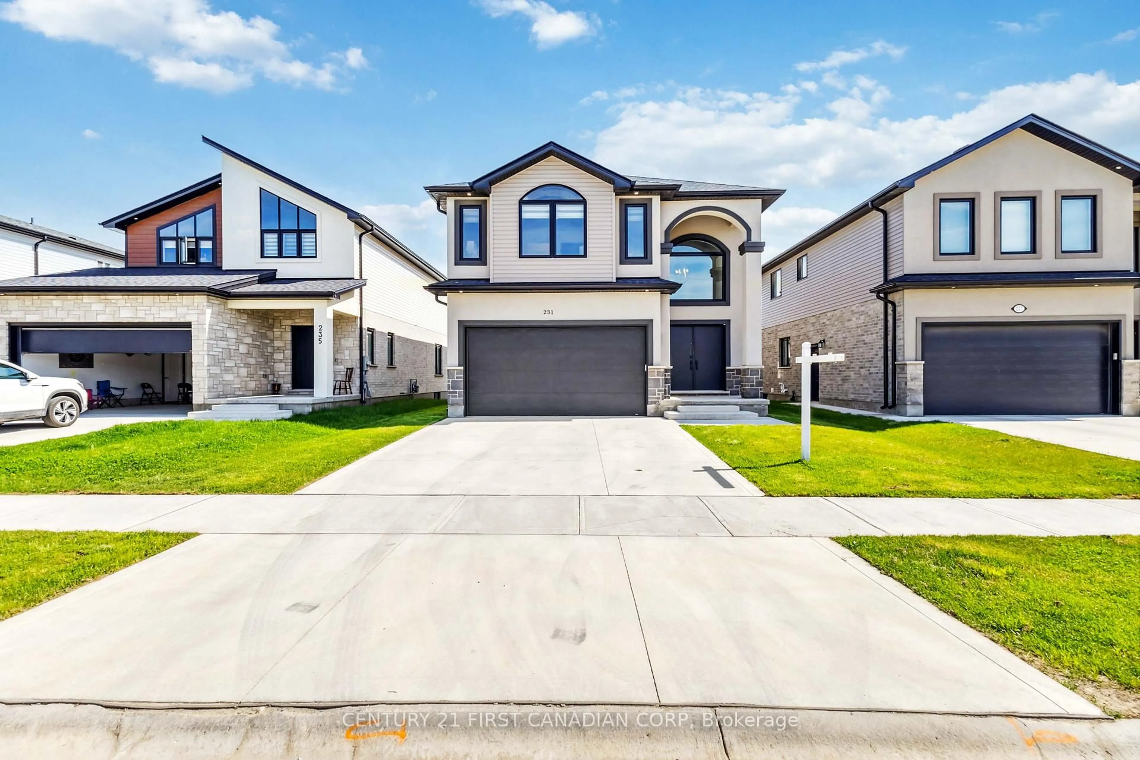 Home with brick exterior material, street for 231 Roy Mcdonald Dr, London South Ontario N6L 0J1