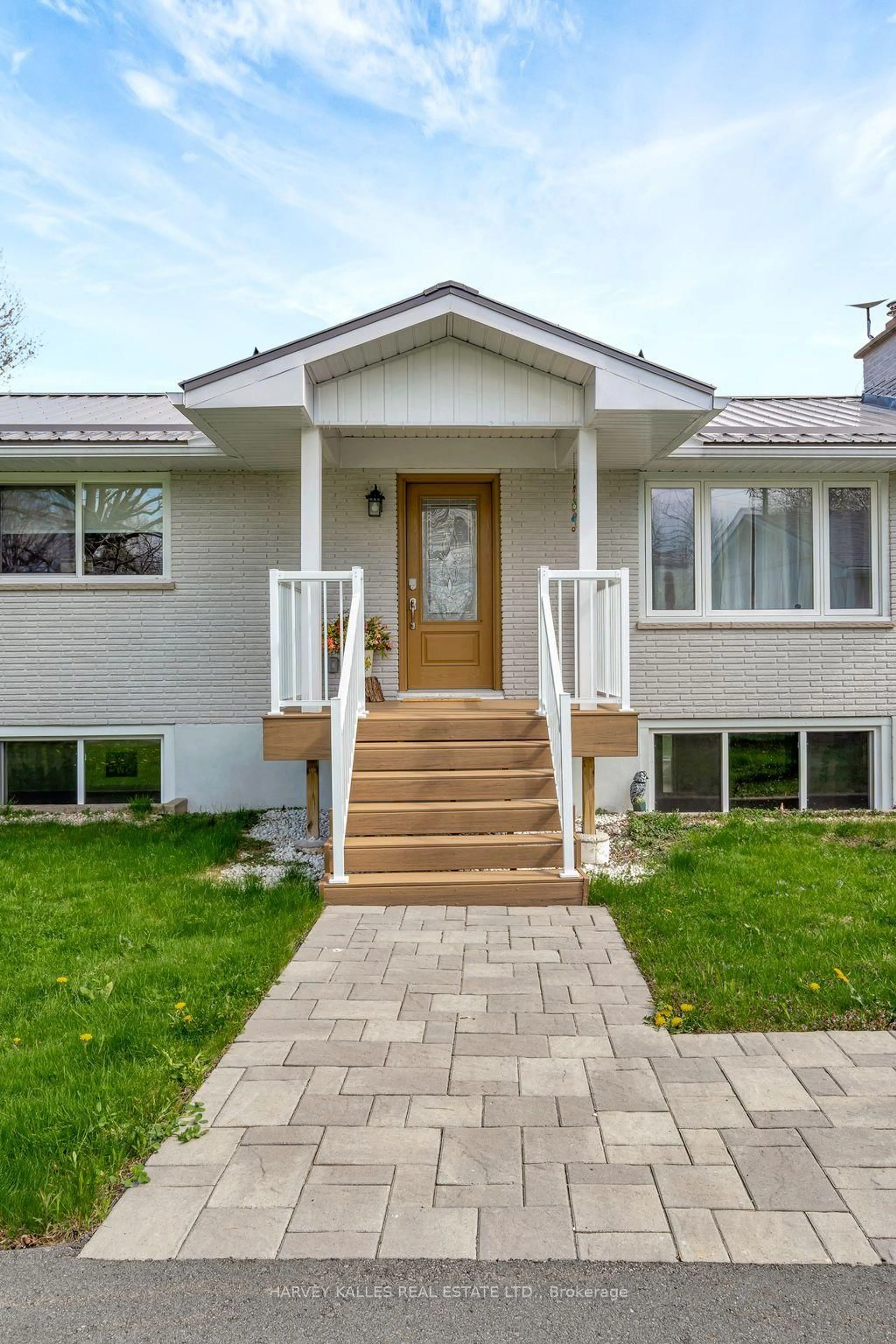 Home with vinyl exterior material, street for 1583 Lakeside Dr, Prince Edward County Ontario K0K 1T0
