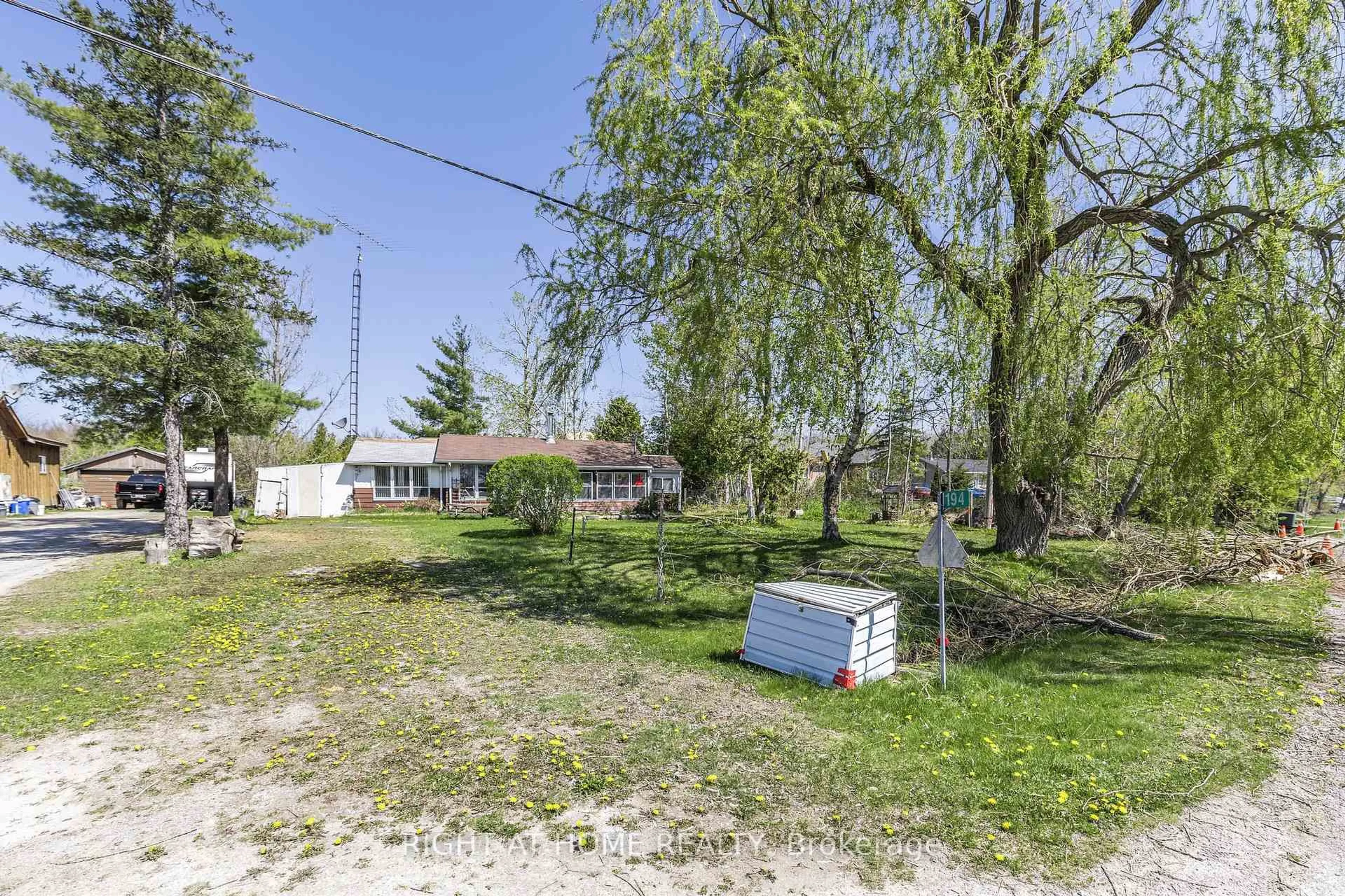 A pic from outside/outdoor area/front of a property/back of a property/a pic from drone, street for 194 Mcguire Beach Rd, Kawartha Lakes Ontario K0M 2B0
