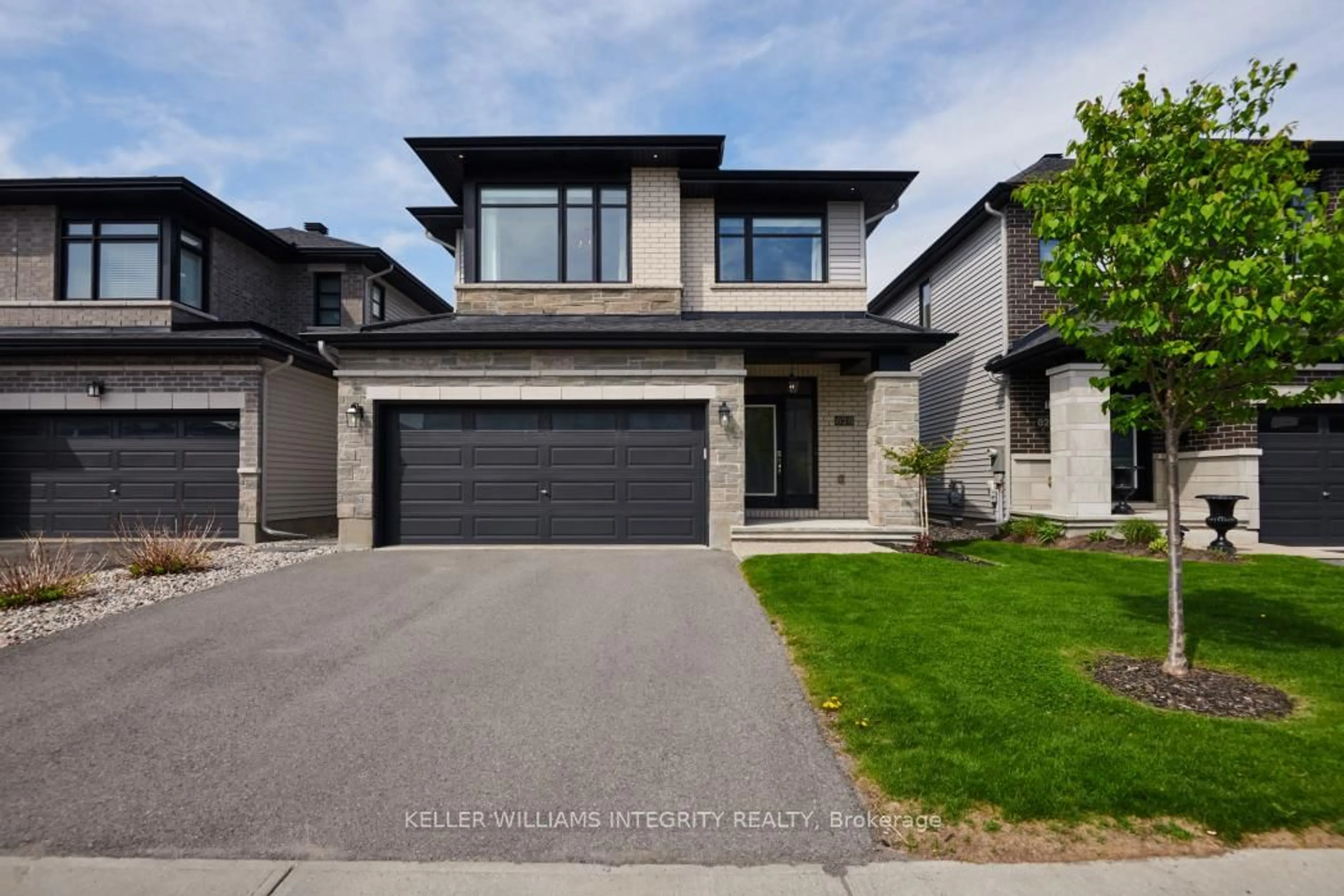 Home with brick exterior material, street for 828 Carnelian Cres, Ottawa Ontario K1X 0A7