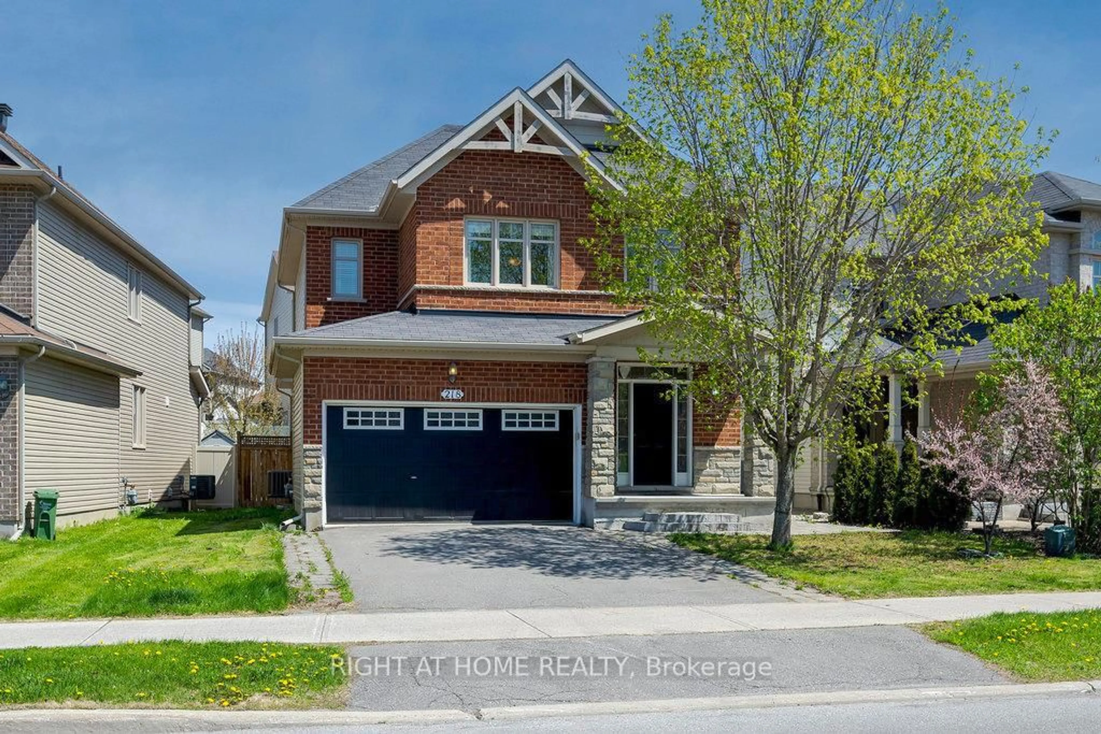 Home with brick exterior material, street for 218 Keyrock Dr, Kanata Ontario K2T 0B4