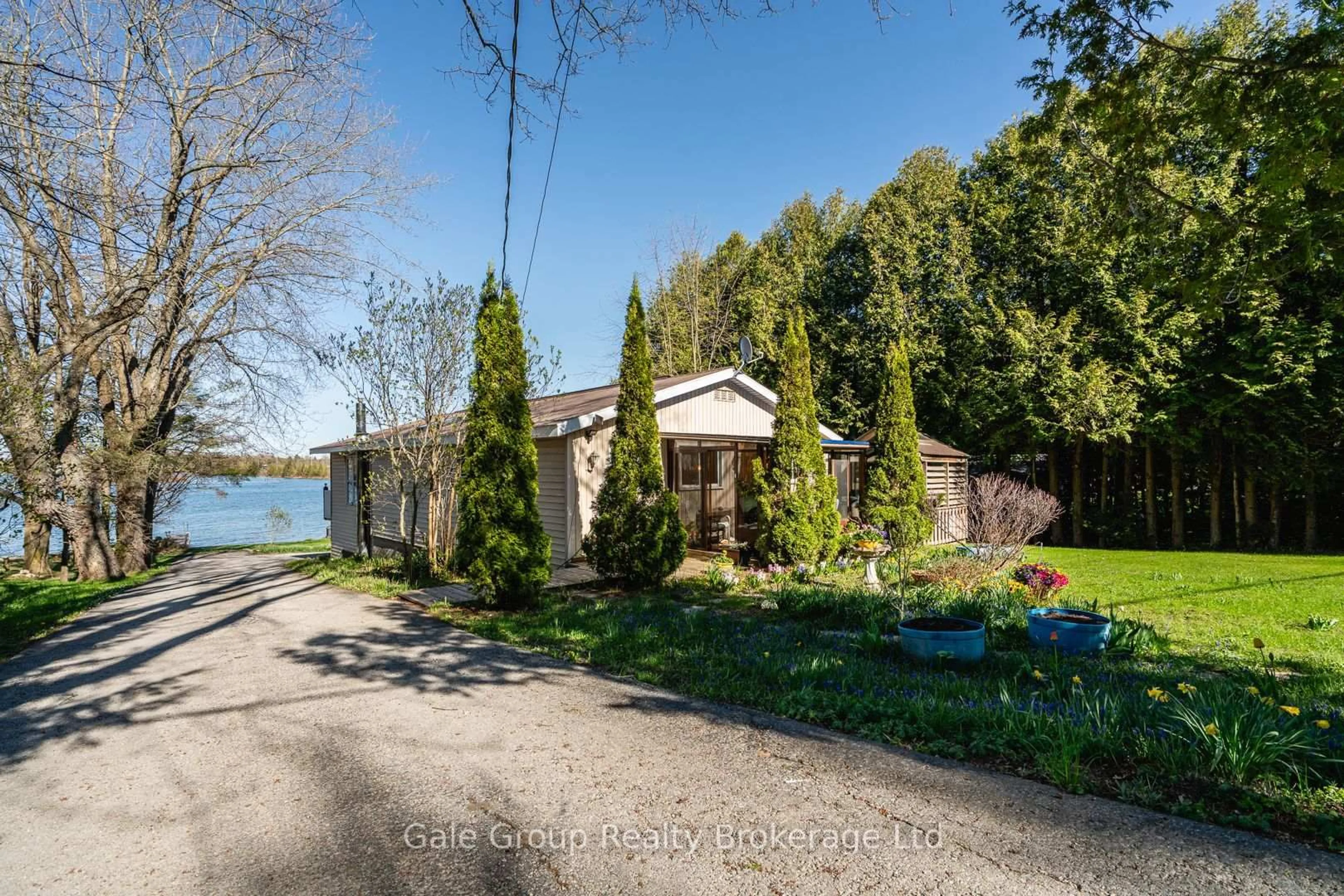 A pic from outside/outdoor area/front of a property/back of a property/a pic from drone, water/lake/river/ocean view for 111 MacDonalds Rd, Grey Highlands Ontario N0C 1E0