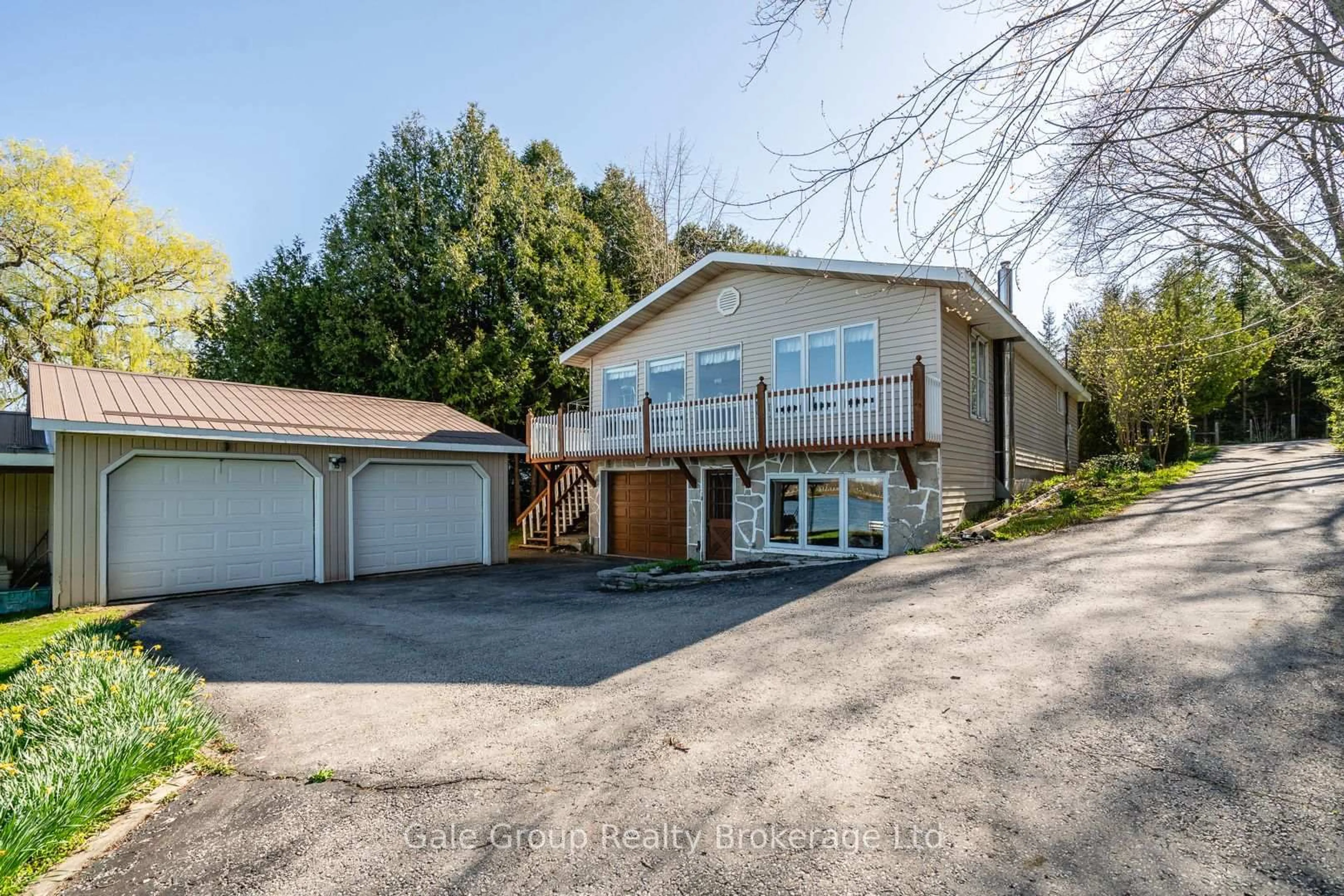 A pic from outside/outdoor area/front of a property/back of a property/a pic from drone, unknown for 111 MacDonalds Rd, Grey Highlands Ontario N0C 1E0
