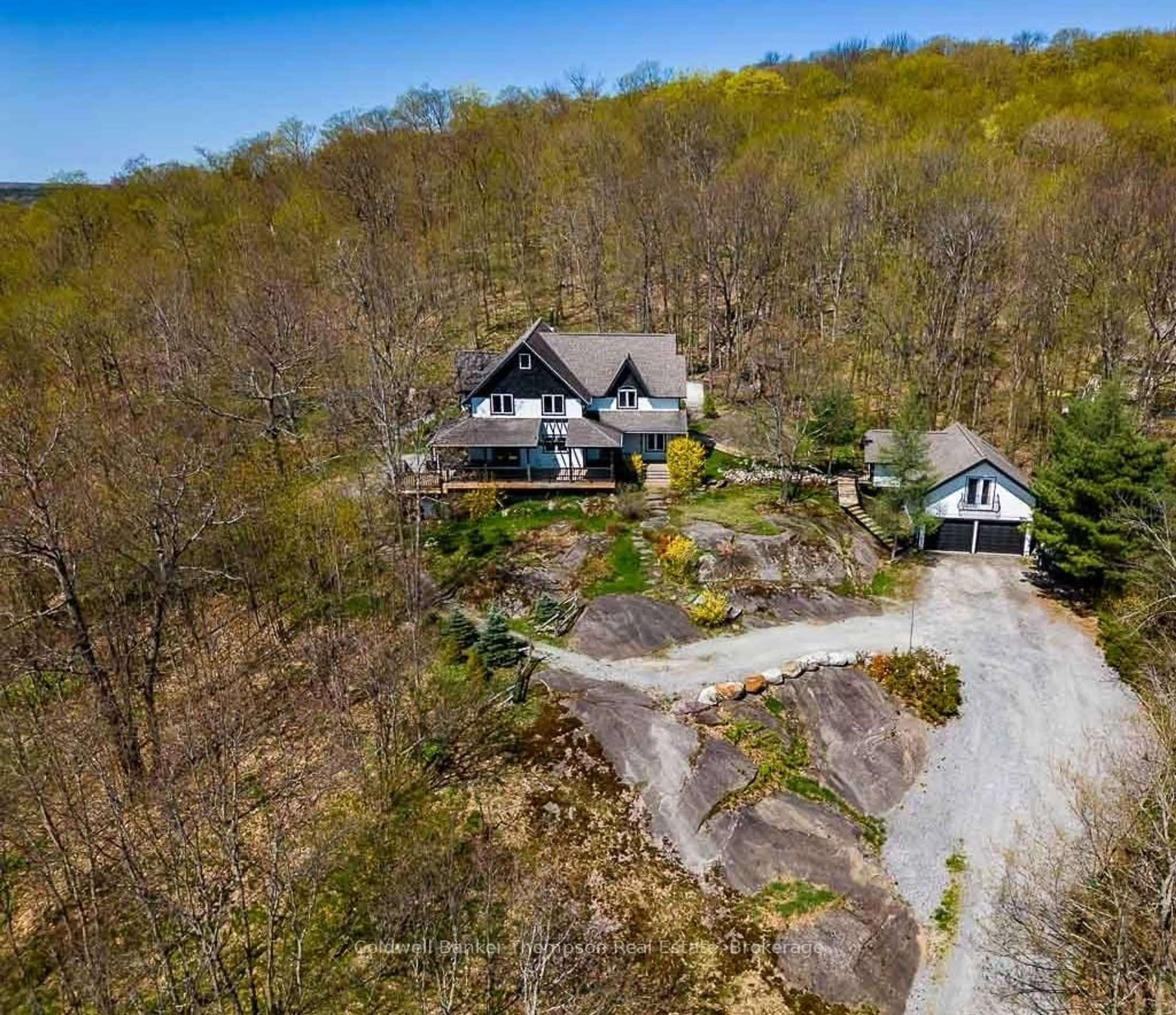 A pic from outside/outdoor area/front of a property/back of a property/a pic from drone, unknown for 54 Logging Tr, Huntsville Ontario P0B 1M0