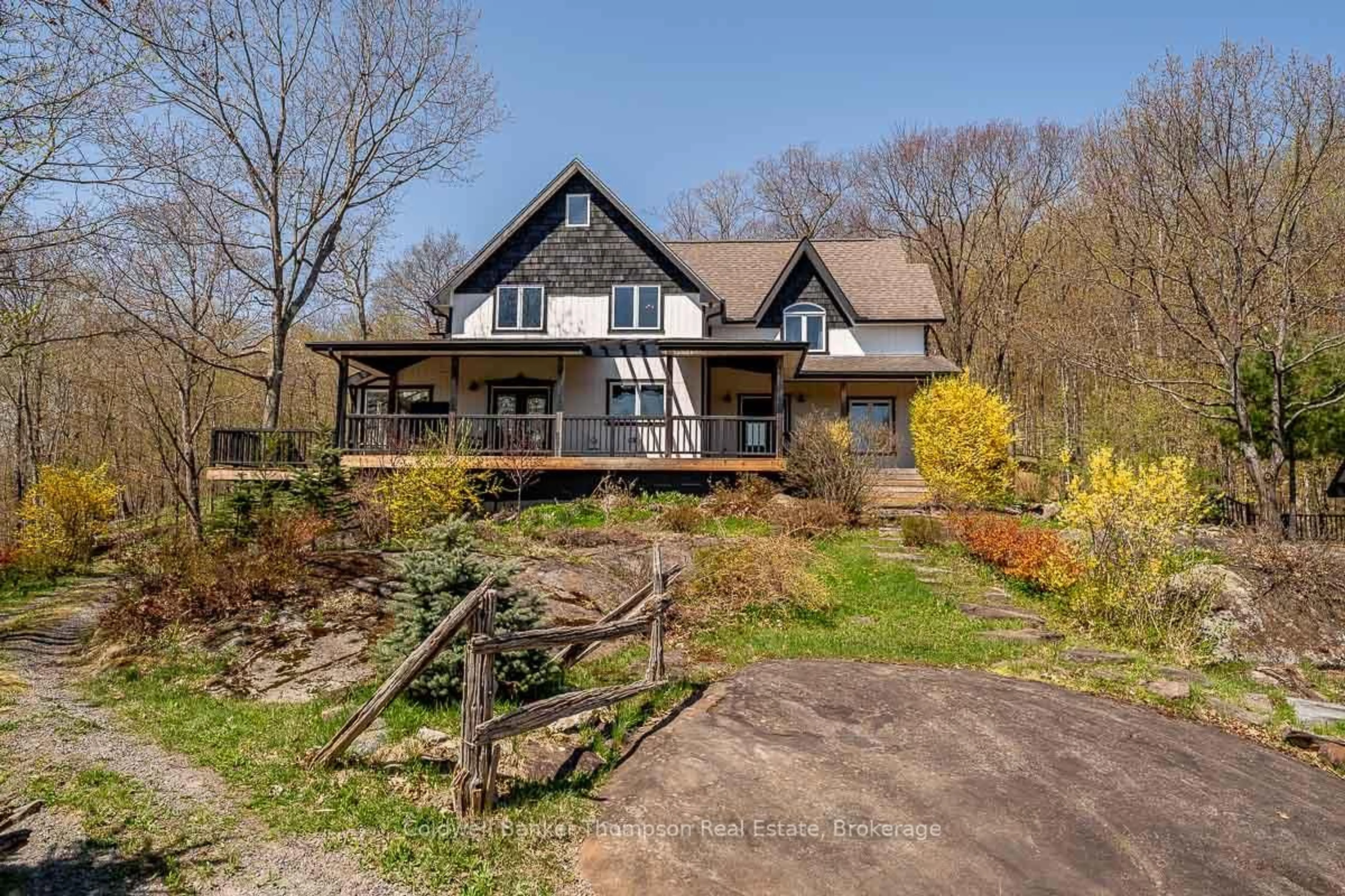 A pic from outside/outdoor area/front of a property/back of a property/a pic from drone, unknown for 54 Logging Tr, Huntsville Ontario P0B 1M0