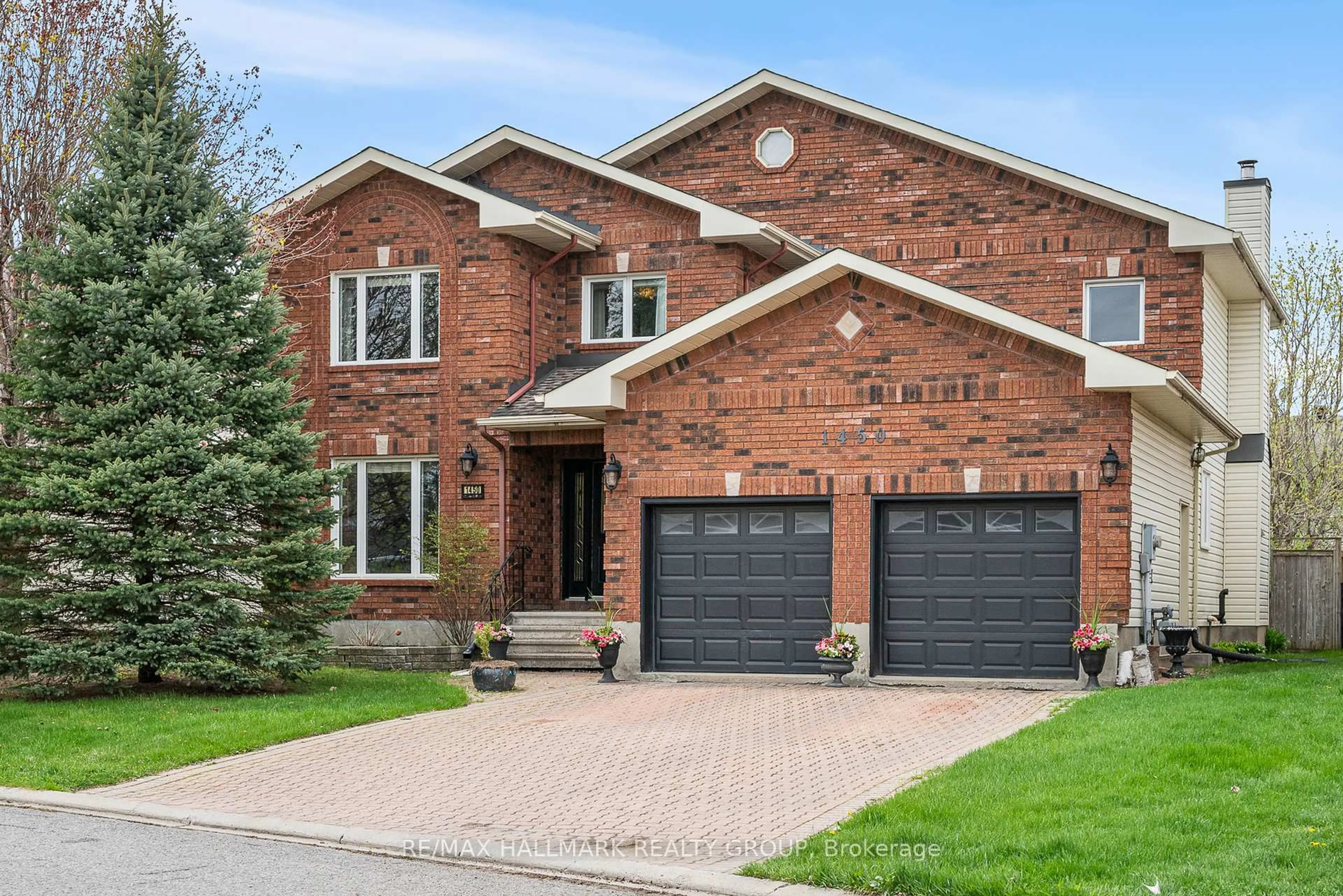 Home with brick exterior material, street for 1450 Charlebois Ave, Ottawa Ontario K1E 3W5