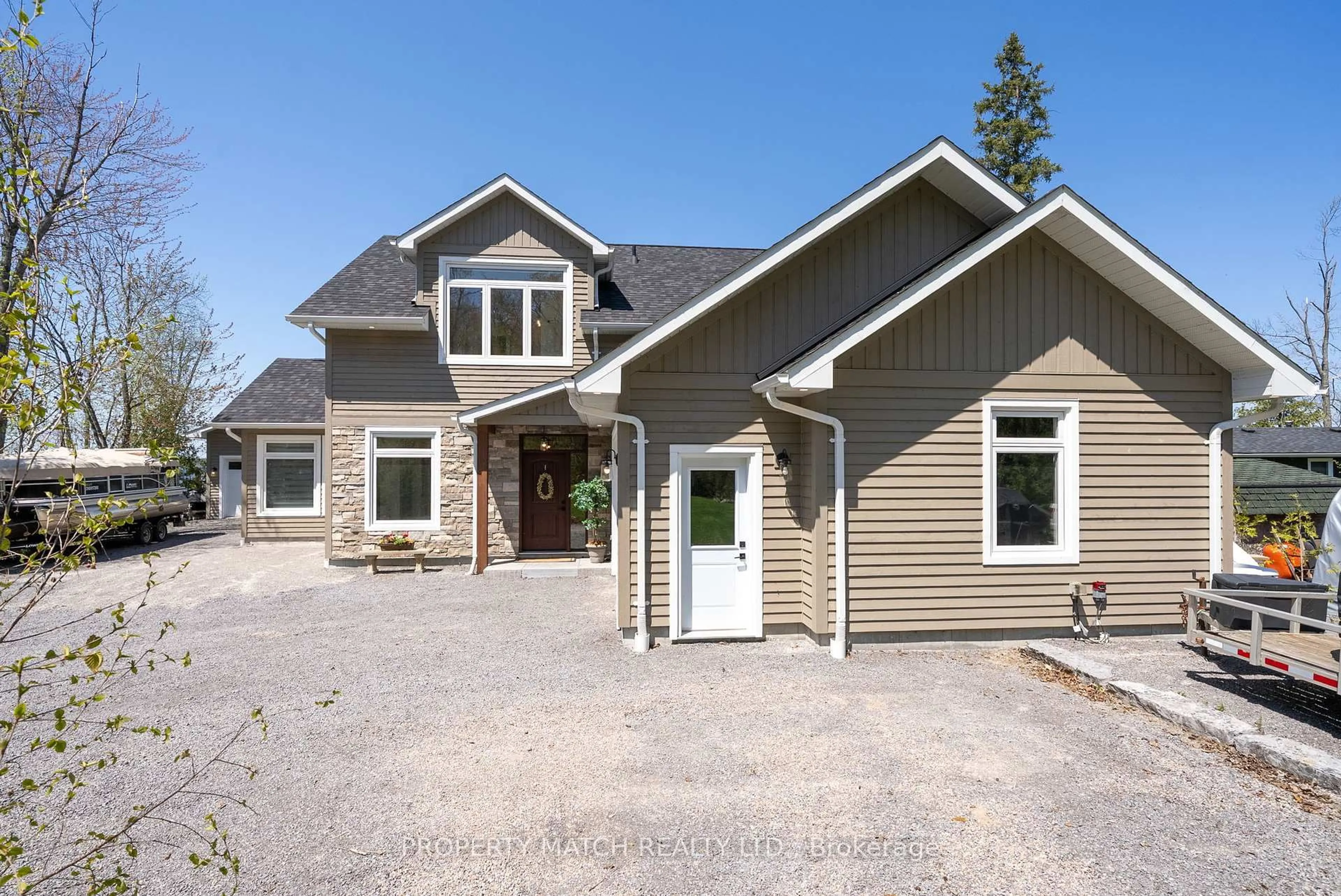 Home with vinyl exterior material, street for 185 Fire Route 72, Trent Lakes Ontario K0L 1J0