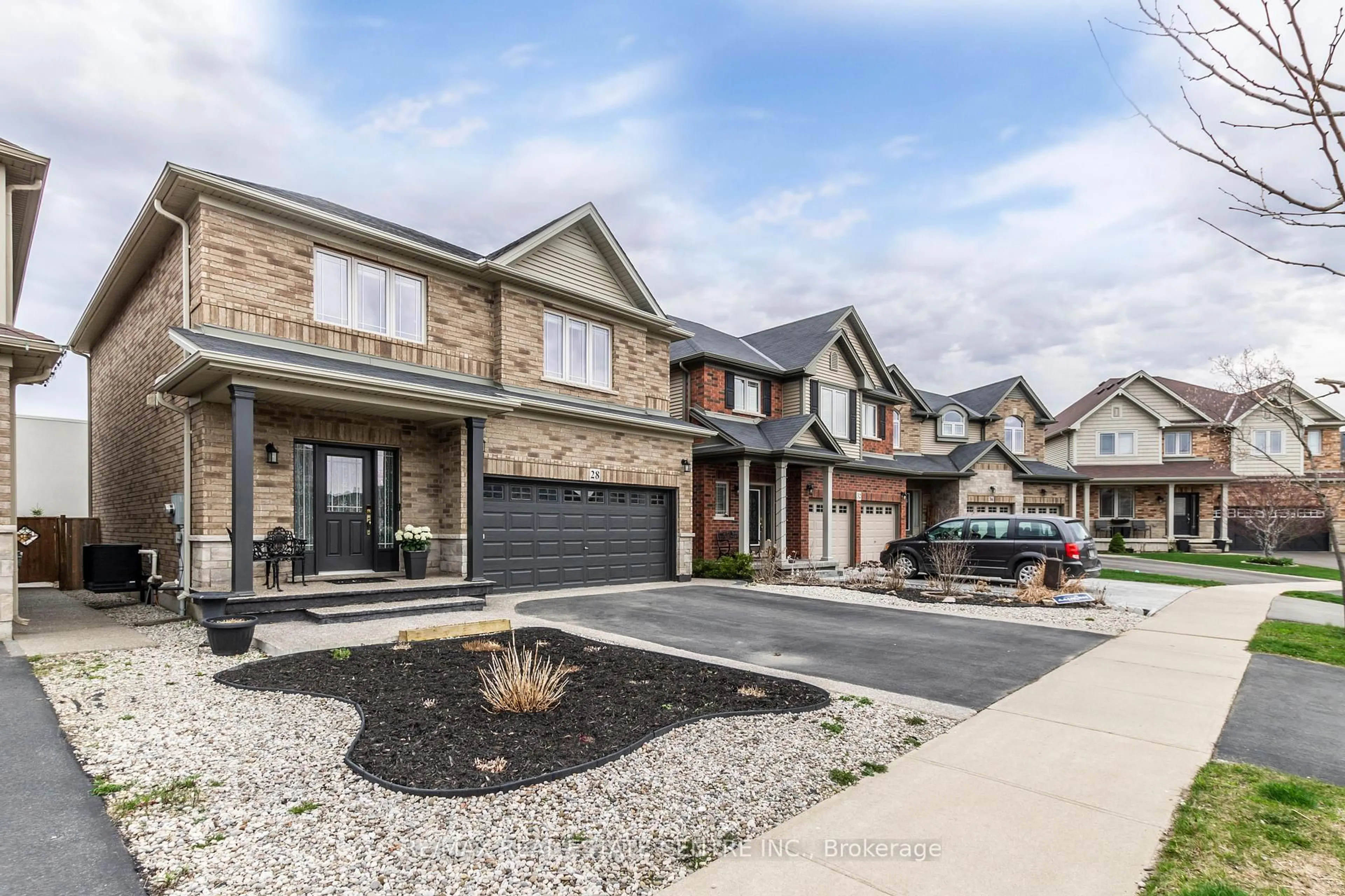 Home with brick exterior material, street for 28 Chamomile Dr, Hamilton Ontario L8W 0C1