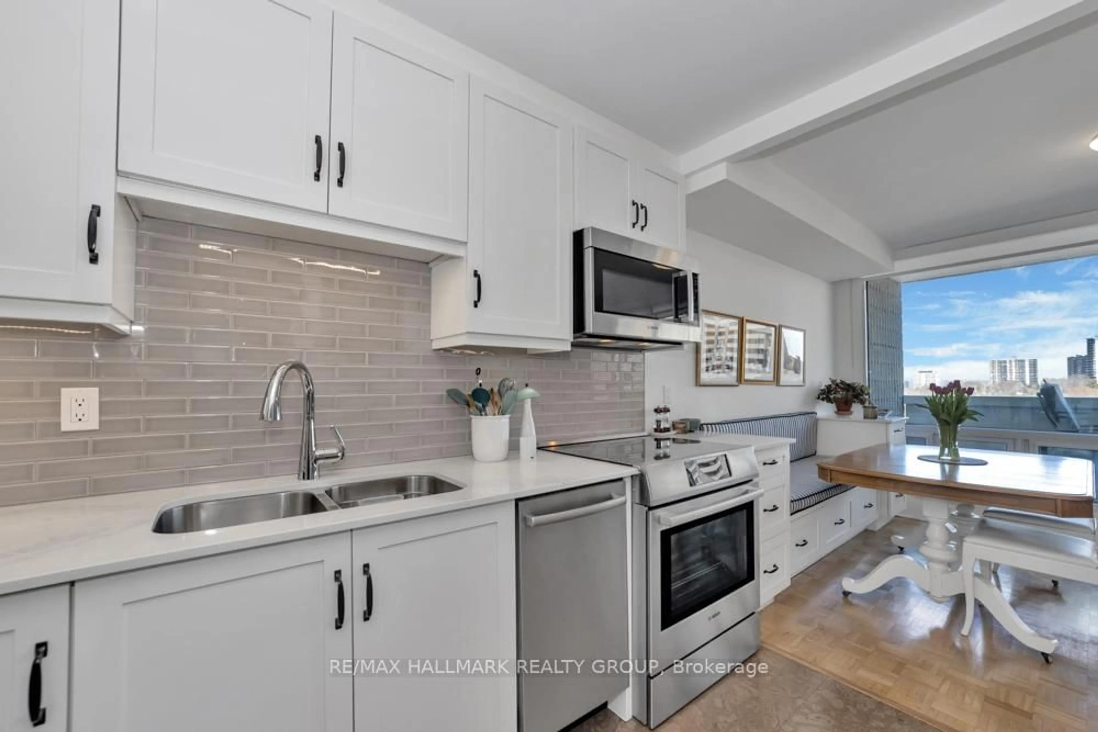 Open concept kitchen, ceramic/tile floor for 265 Poulin Ave #602, Ottawa Ontario K2B 7Y8