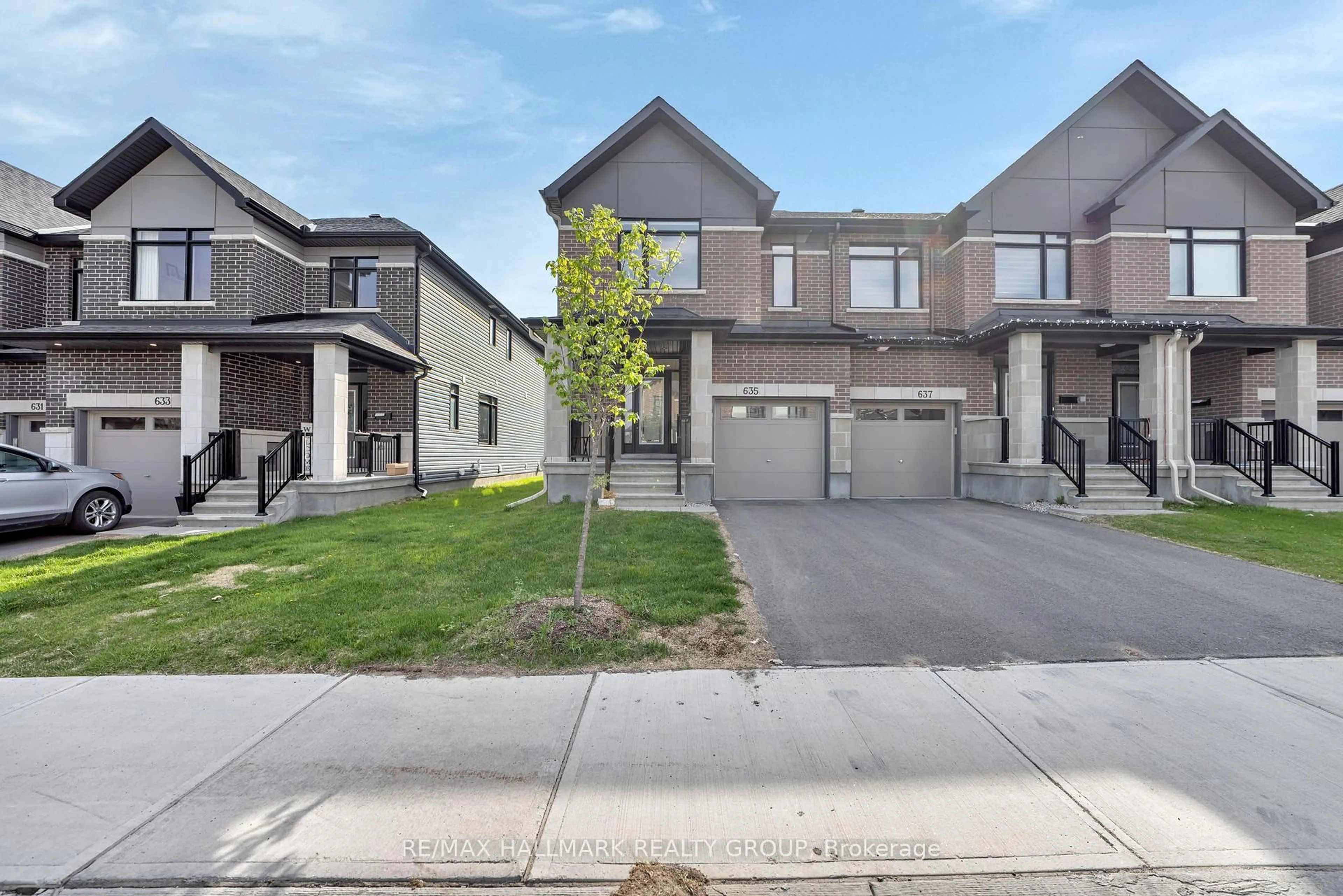 A pic from outside/outdoor area/front of a property/back of a property/a pic from drone, street for 635 Rathburn Lane, Ottawa Ontario K1T 0V9