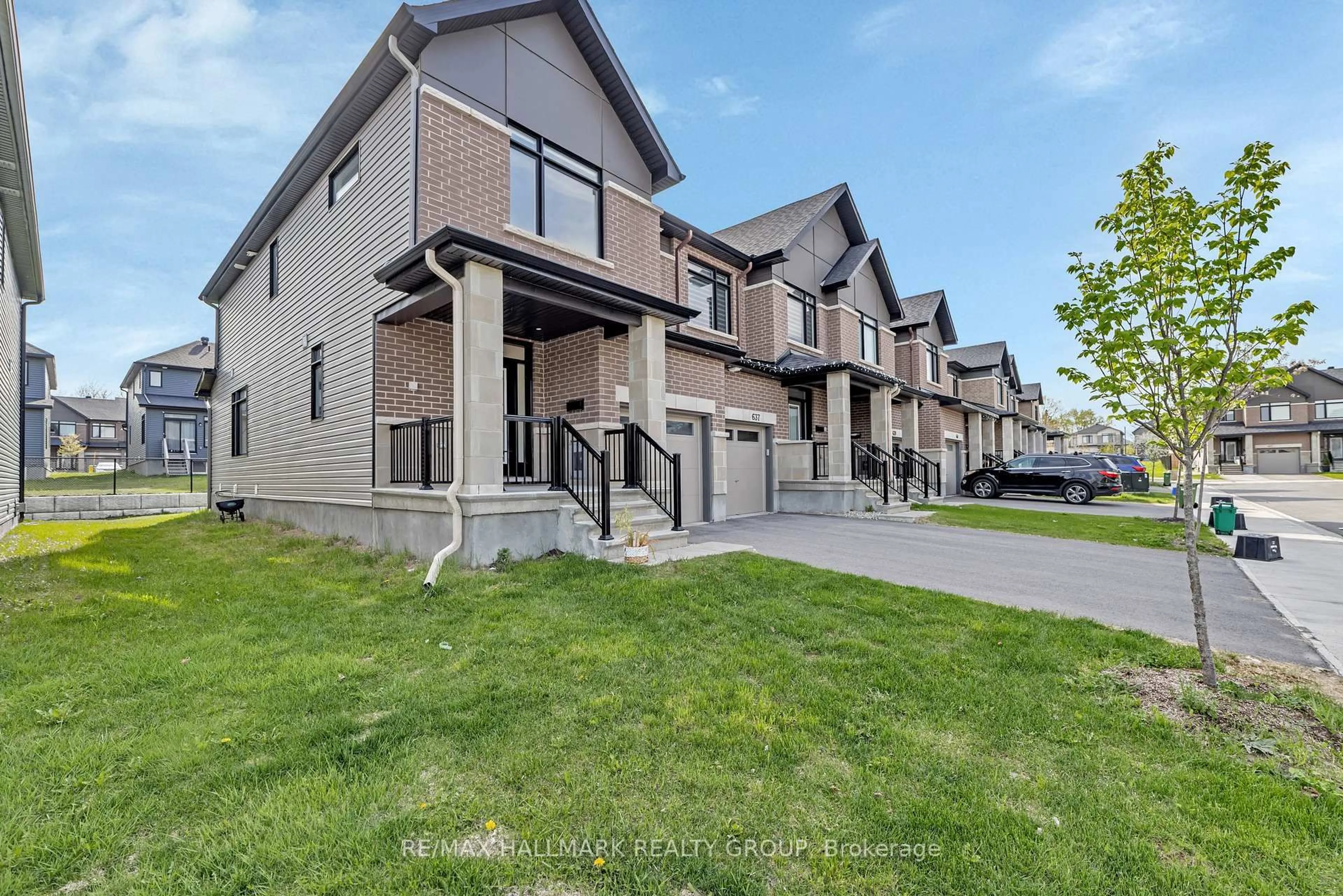 A pic from outside/outdoor area/front of a property/back of a property/a pic from drone, street for 635 Rathburn Lane, Ottawa Ontario K1T 0V9