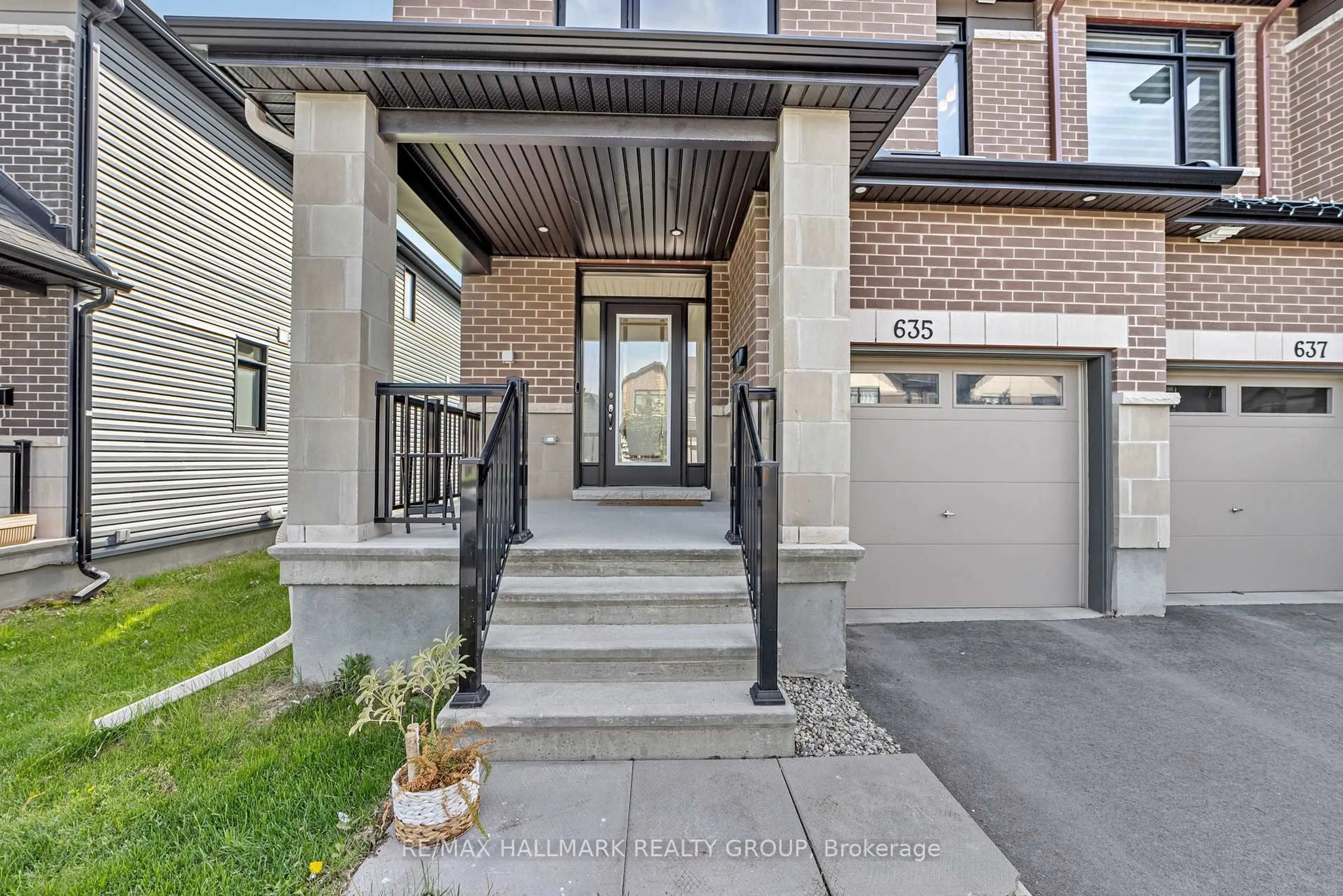 Home with brick exterior material, street for 635 Rathburn Lane, Ottawa Ontario K1T 0V9