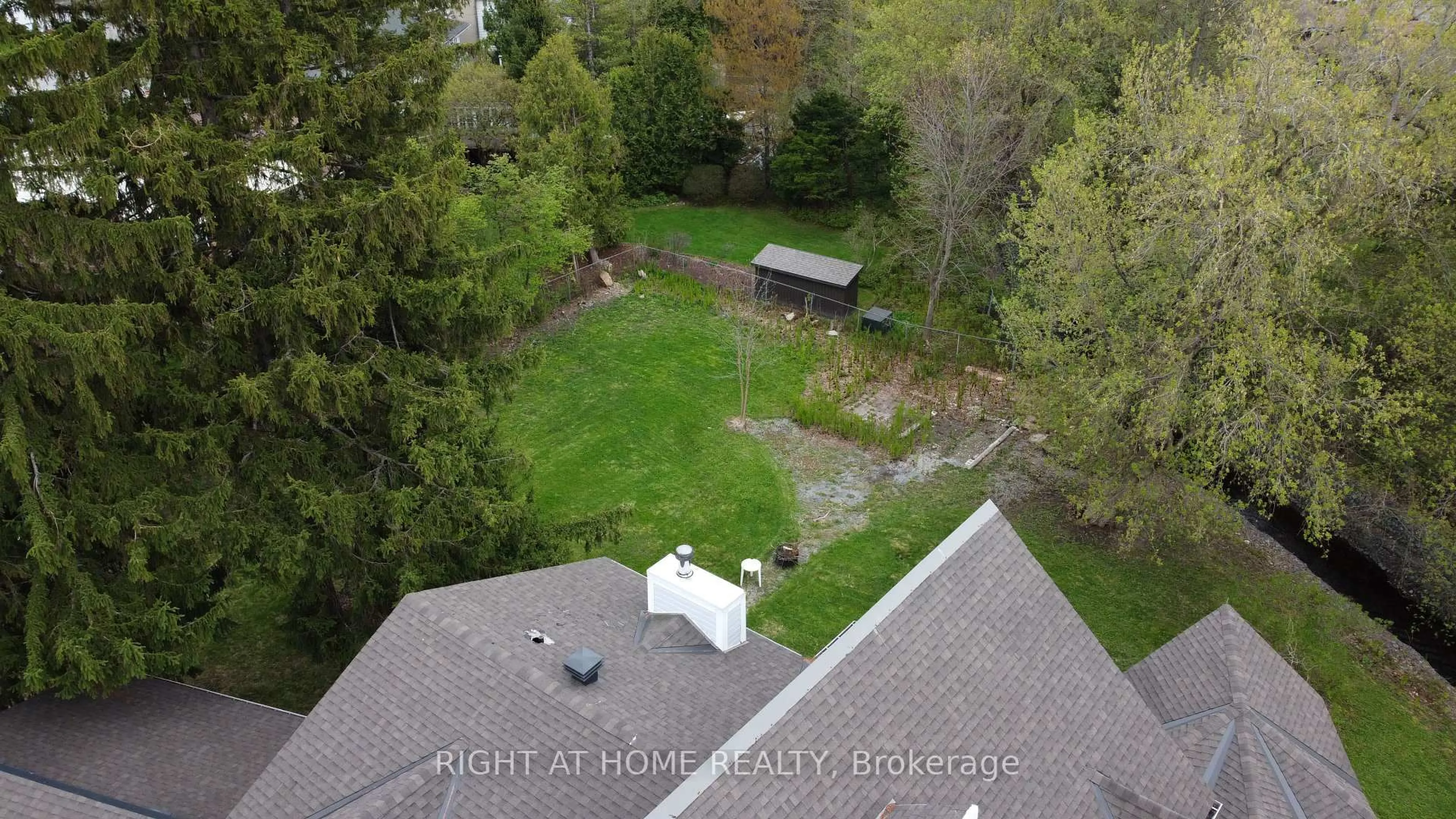 A pic from outside/outdoor area/front of a property/back of a property/a pic from drone, water/lake/river/ocean view for 3208 Richmond Rd, Ottawa Ontario K2H 5B6