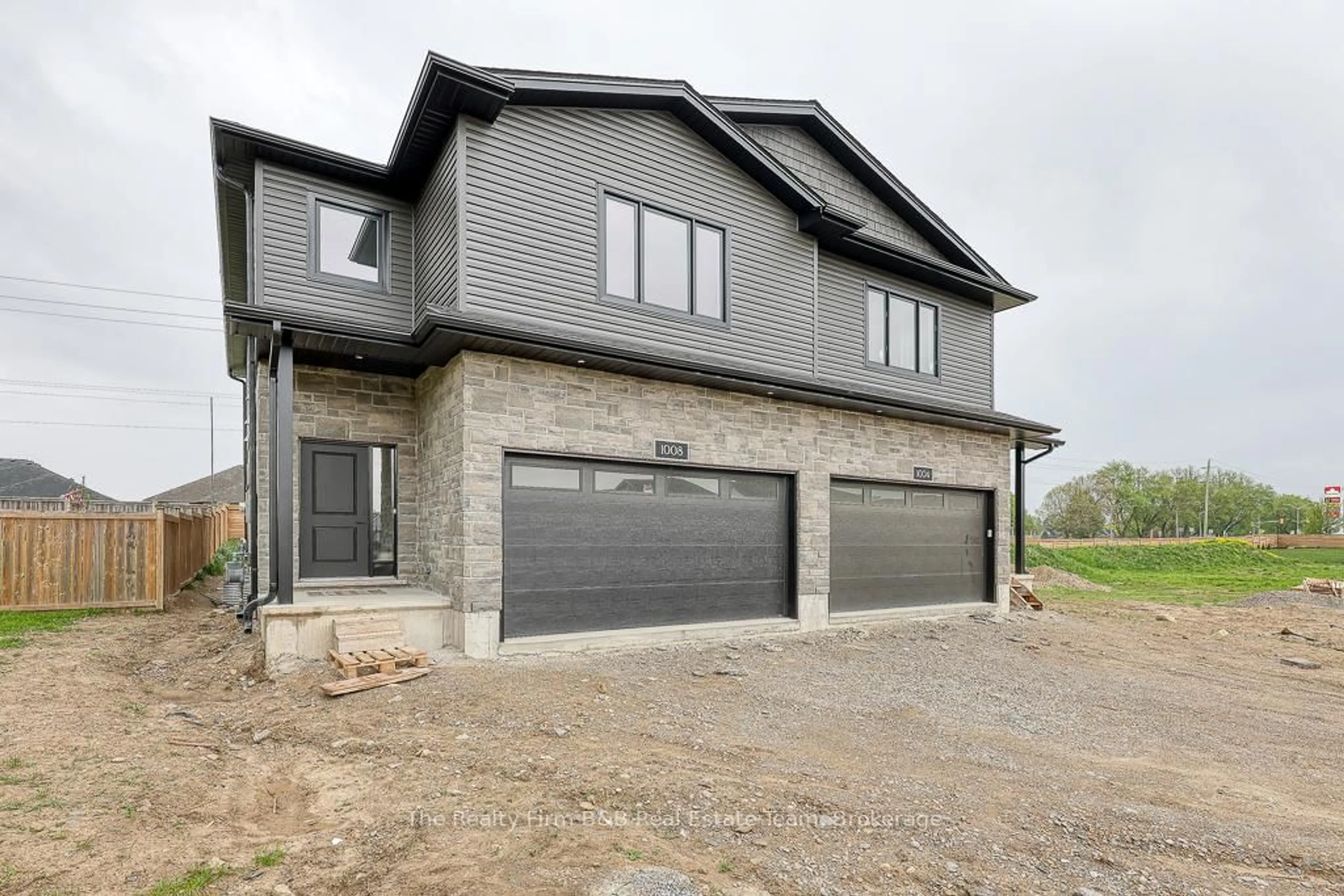 Home with brick exterior material, street for 1008 DOWNING Dr, Woodstock Ontario N4T 0K4
