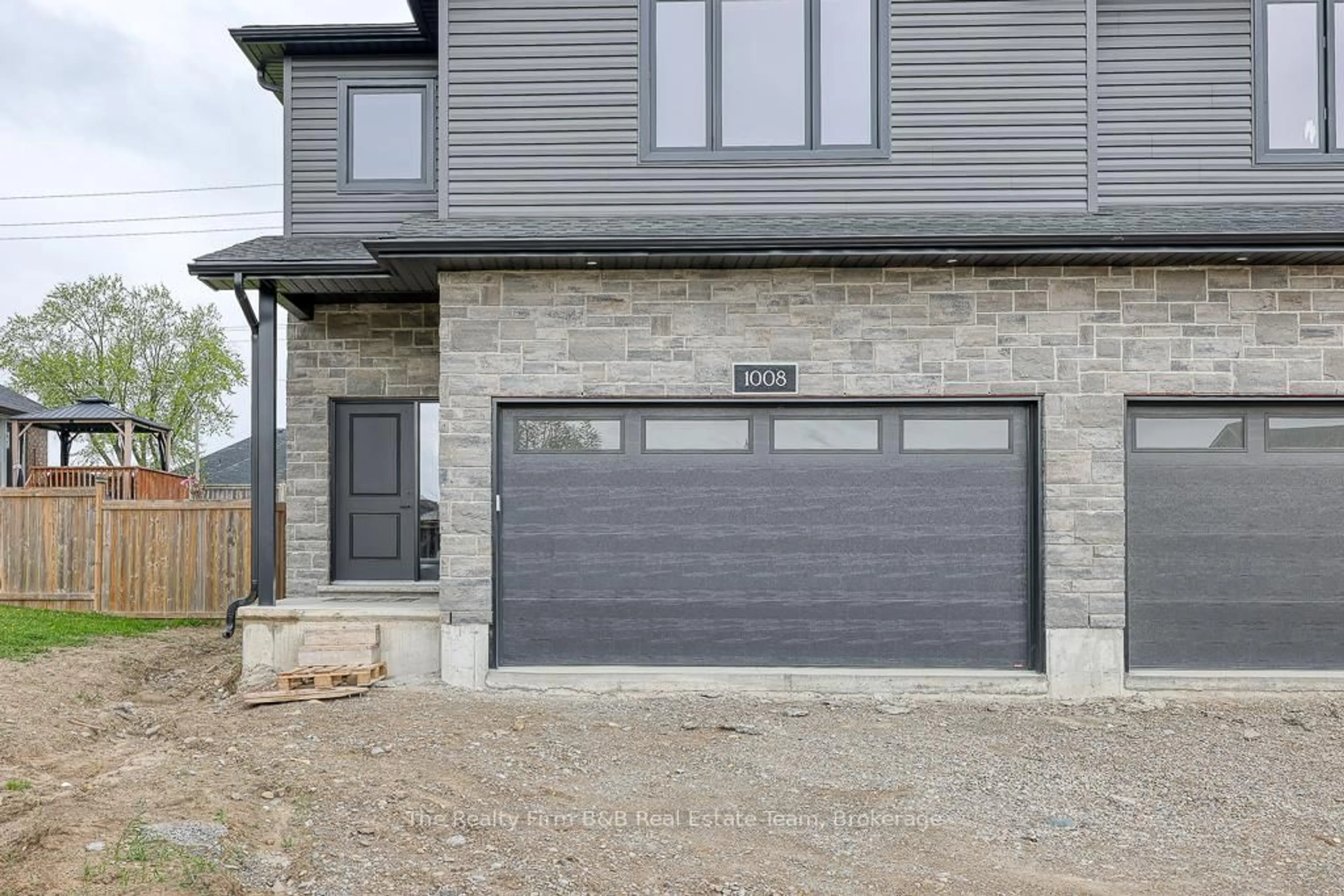 Home with brick exterior material, street for 1008 DOWNING Dr, Woodstock Ontario N4T 0K4