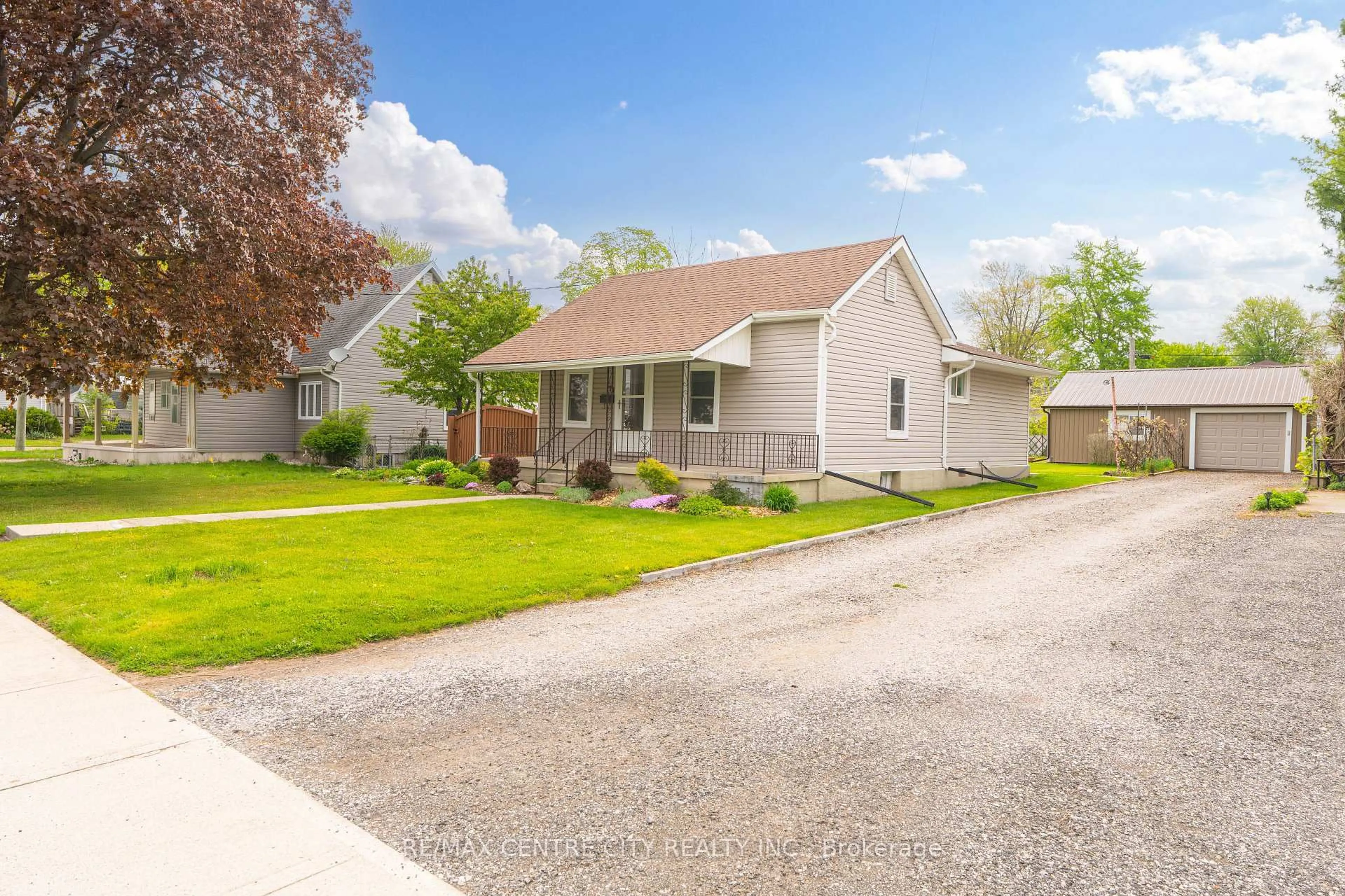 Home with vinyl exterior material, street for 70 Scott St, Strathroy-Caradoc Ontario N7G 1J4