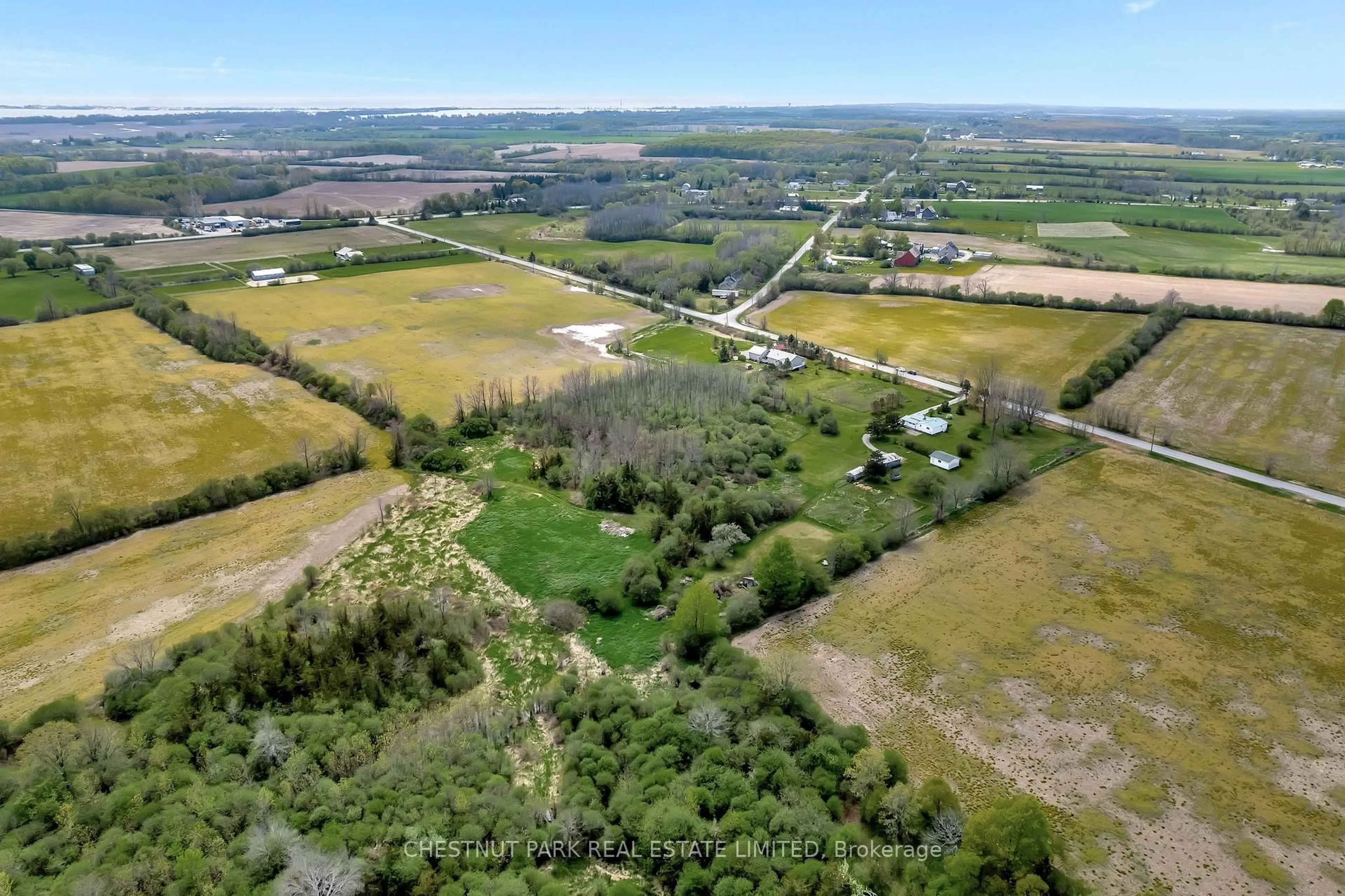 A pic from outside/outdoor area/front of a property/back of a property/a pic from drone, unknown for 418 Matthie Rd, Prince Edward County Ontario K0K 1G0