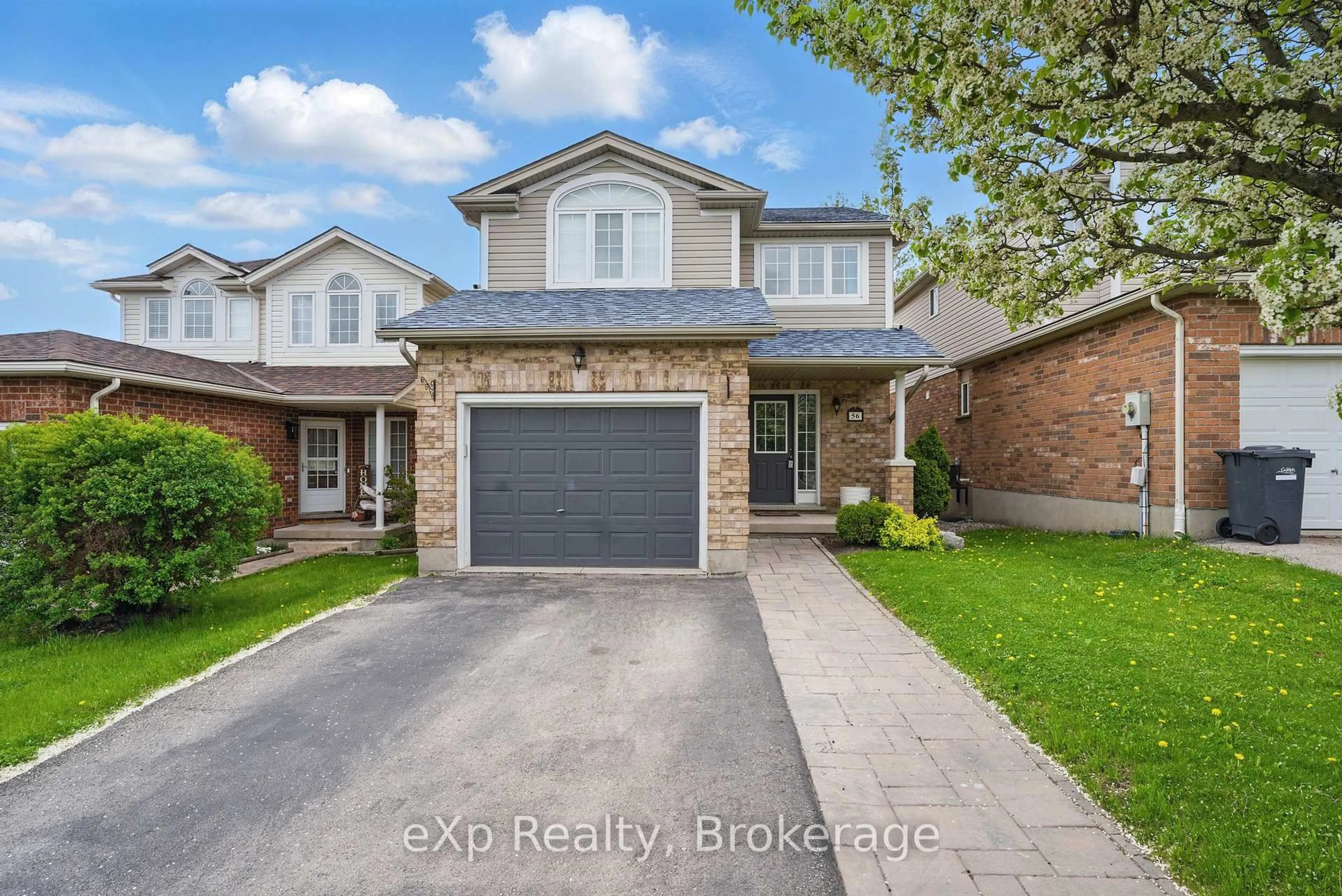 Home with brick exterior material, street for 56 Shackleton Dr, Guelph Ontario N1E 7L3