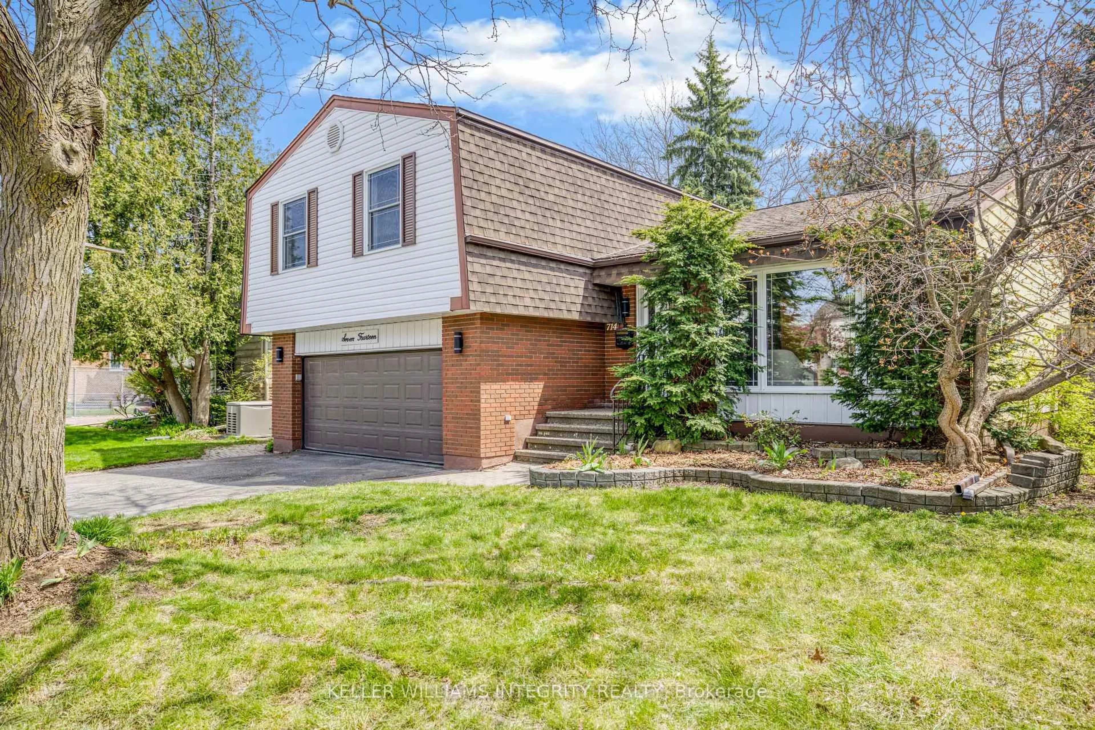 Home with vinyl exterior material, street for 714 Mooneys Bay Pl, Ottawa Ontario K1V 9R2
