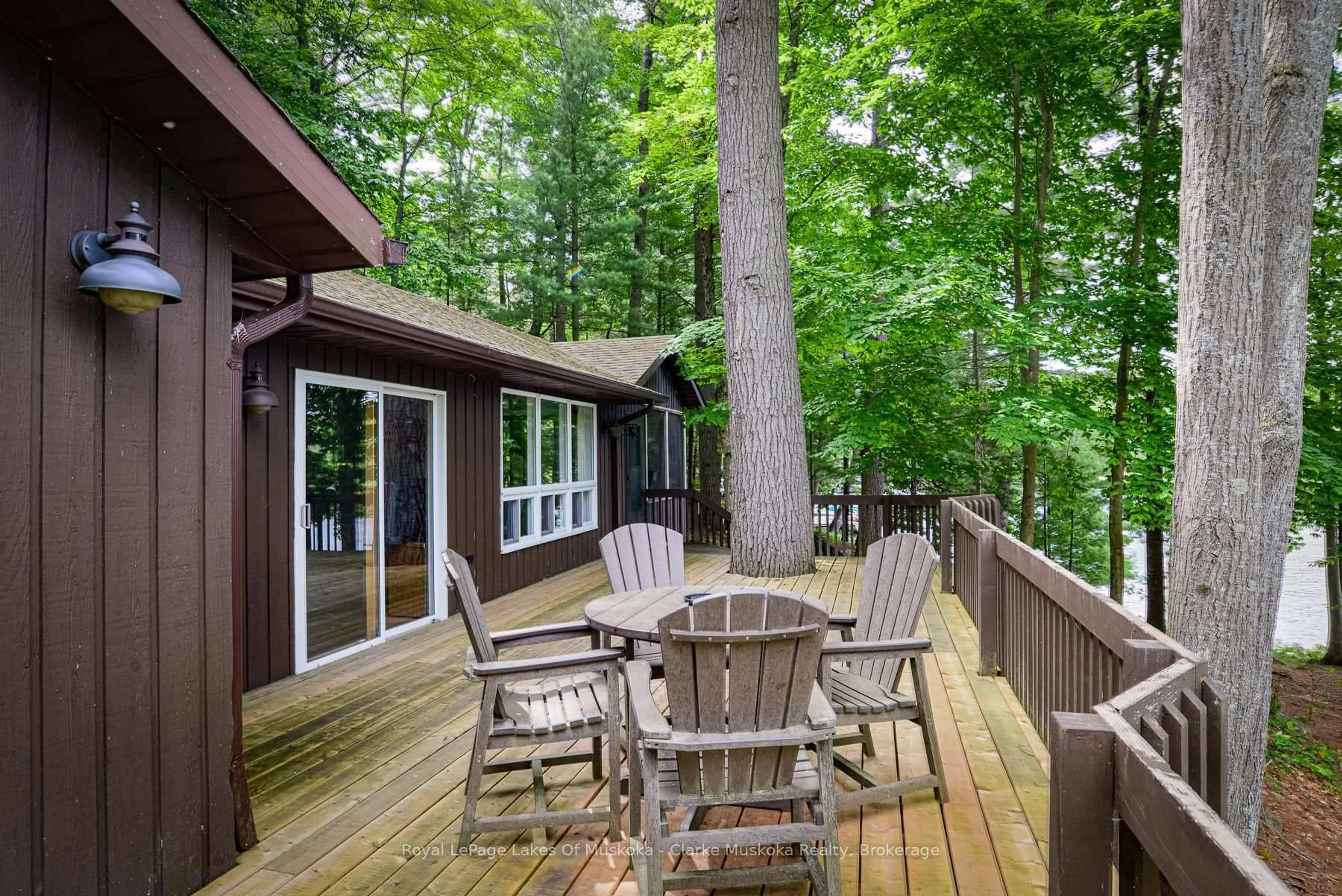 Patio, forest/trees view for 1007 OMINECA Rd #6, Muskoka Lakes Ontario P0B 1J0