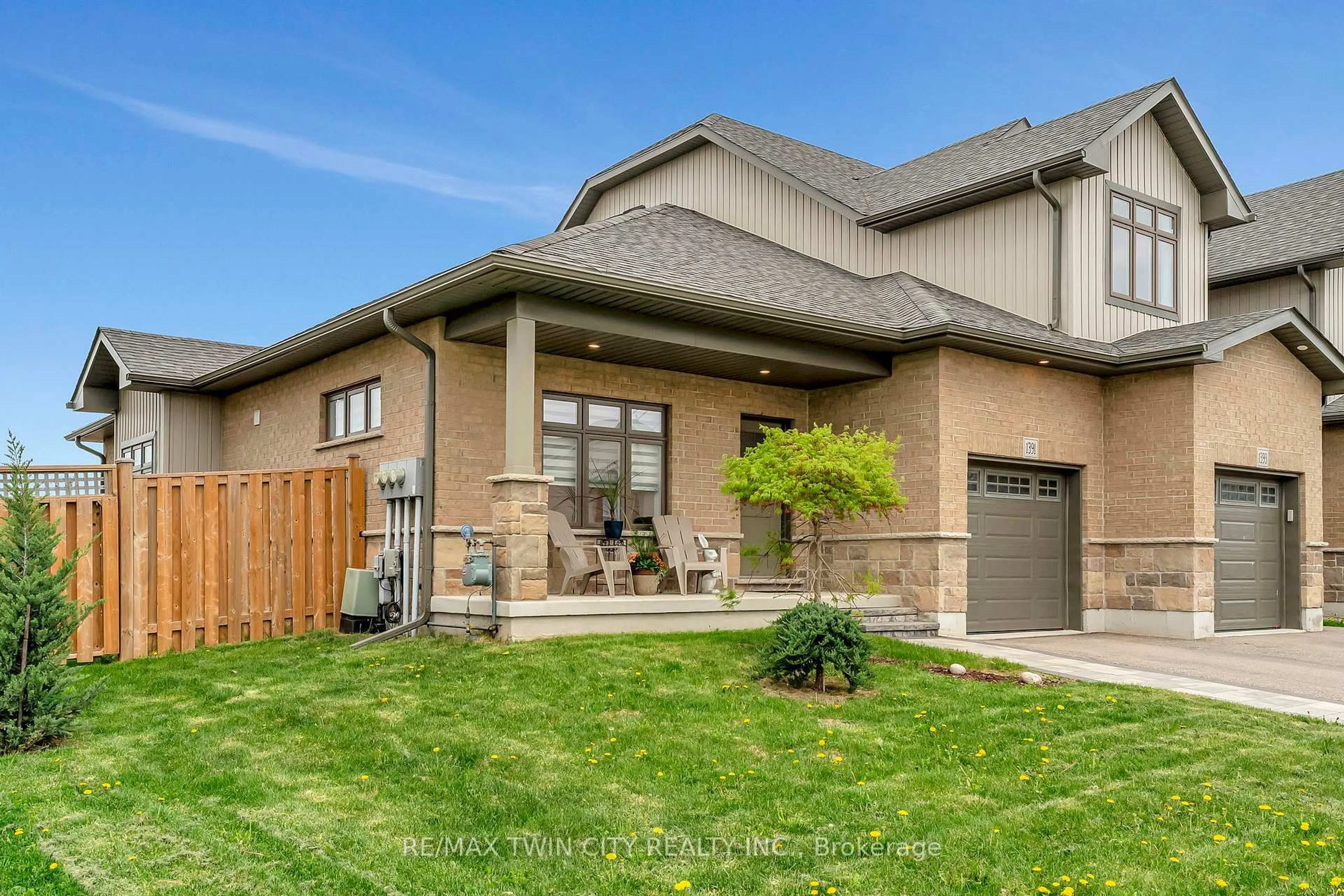 Home with brick exterior material, street for 1391 Countrystone Dr, Kitchener Ontario N2N 3R8