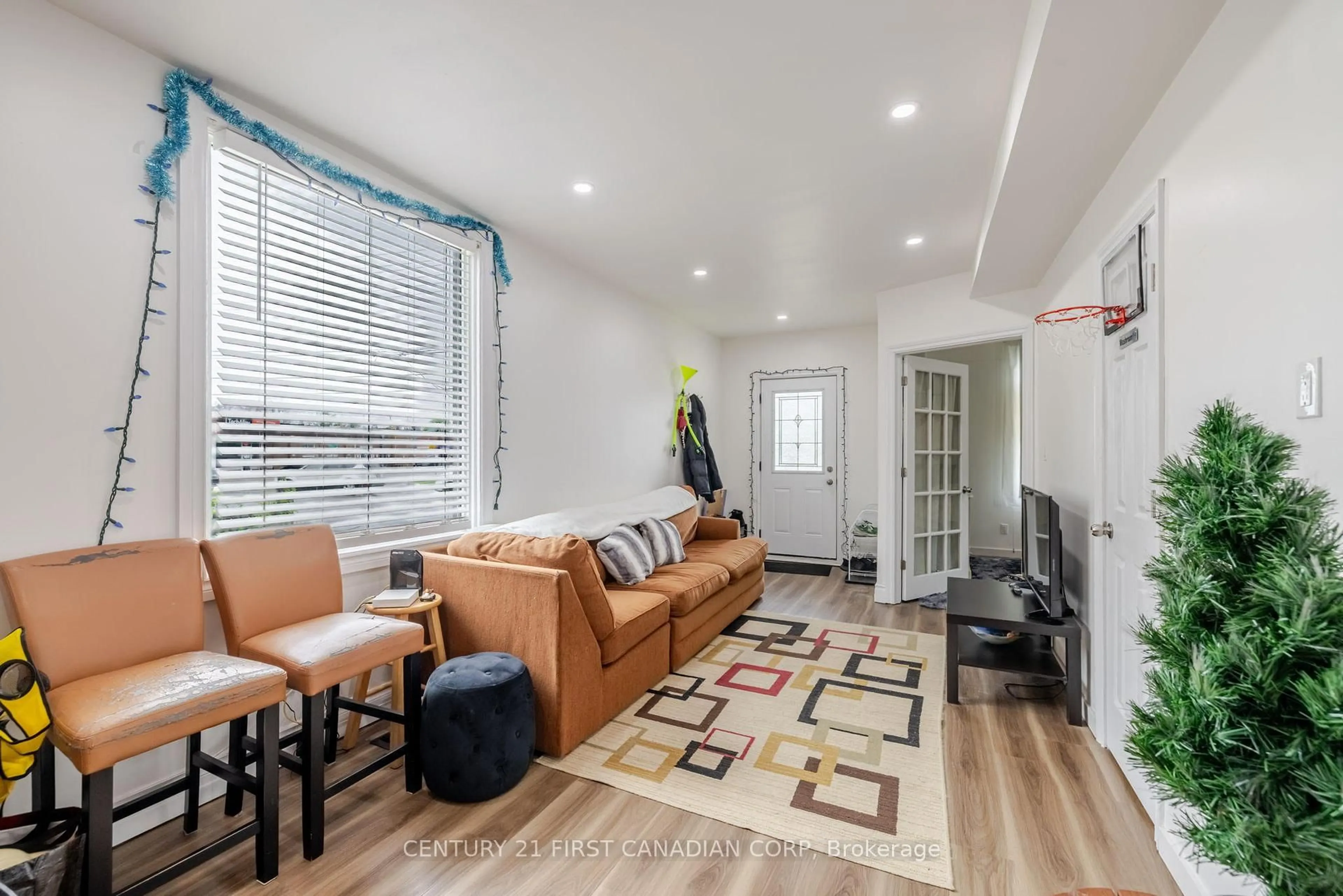 Living room with furniture, wood/laminate floor for 30 Oxford St, London North Ontario N6H 1R3