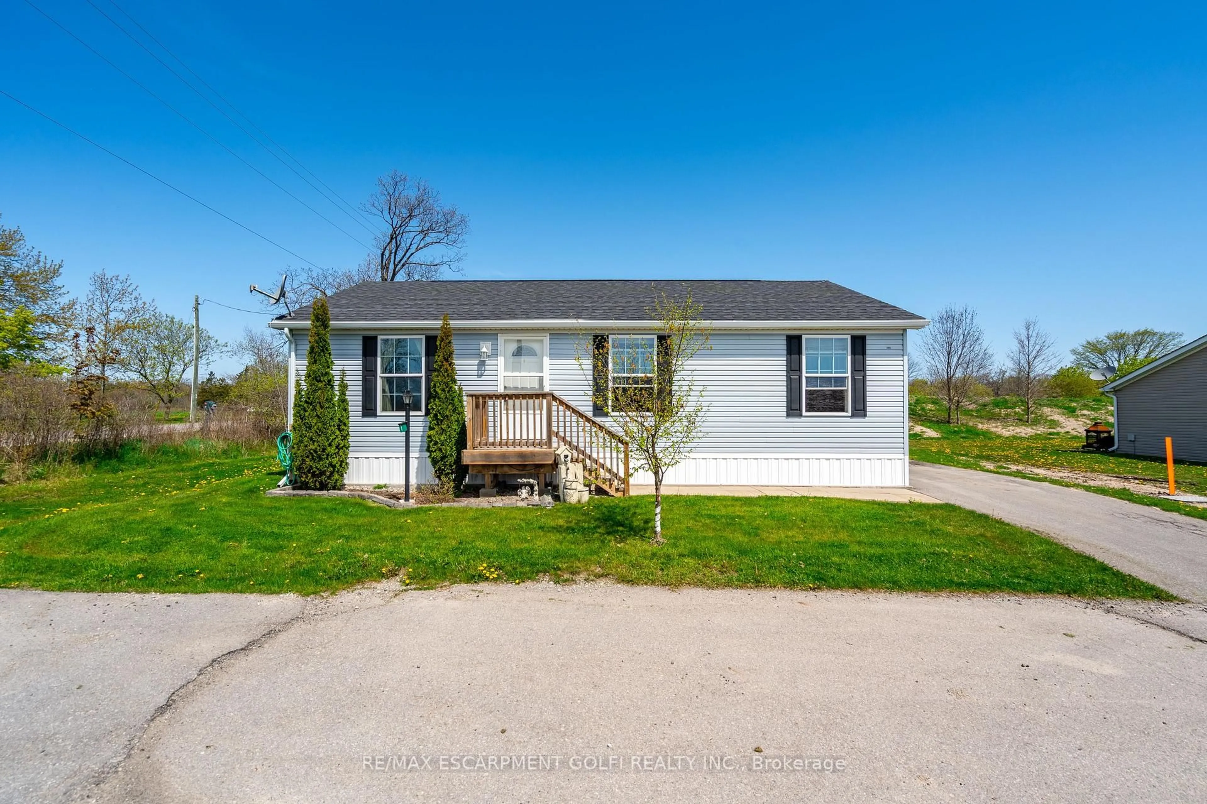 Home with vinyl exterior material, street for 1 Forest Tr, Haldimand Ontario N0A 1L0