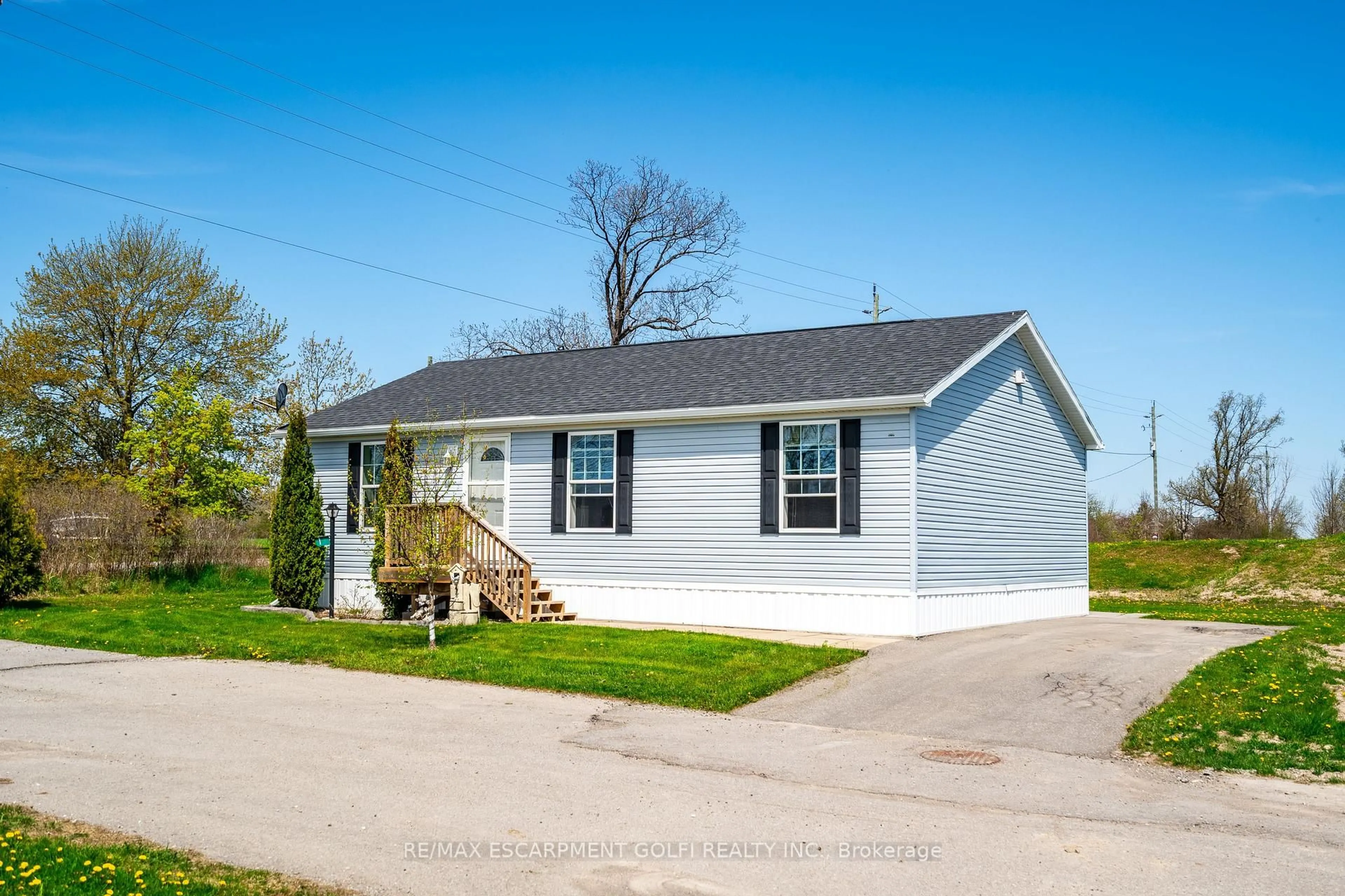 Home with vinyl exterior material, street for 1 Forest Tr, Haldimand Ontario N0A 1L0