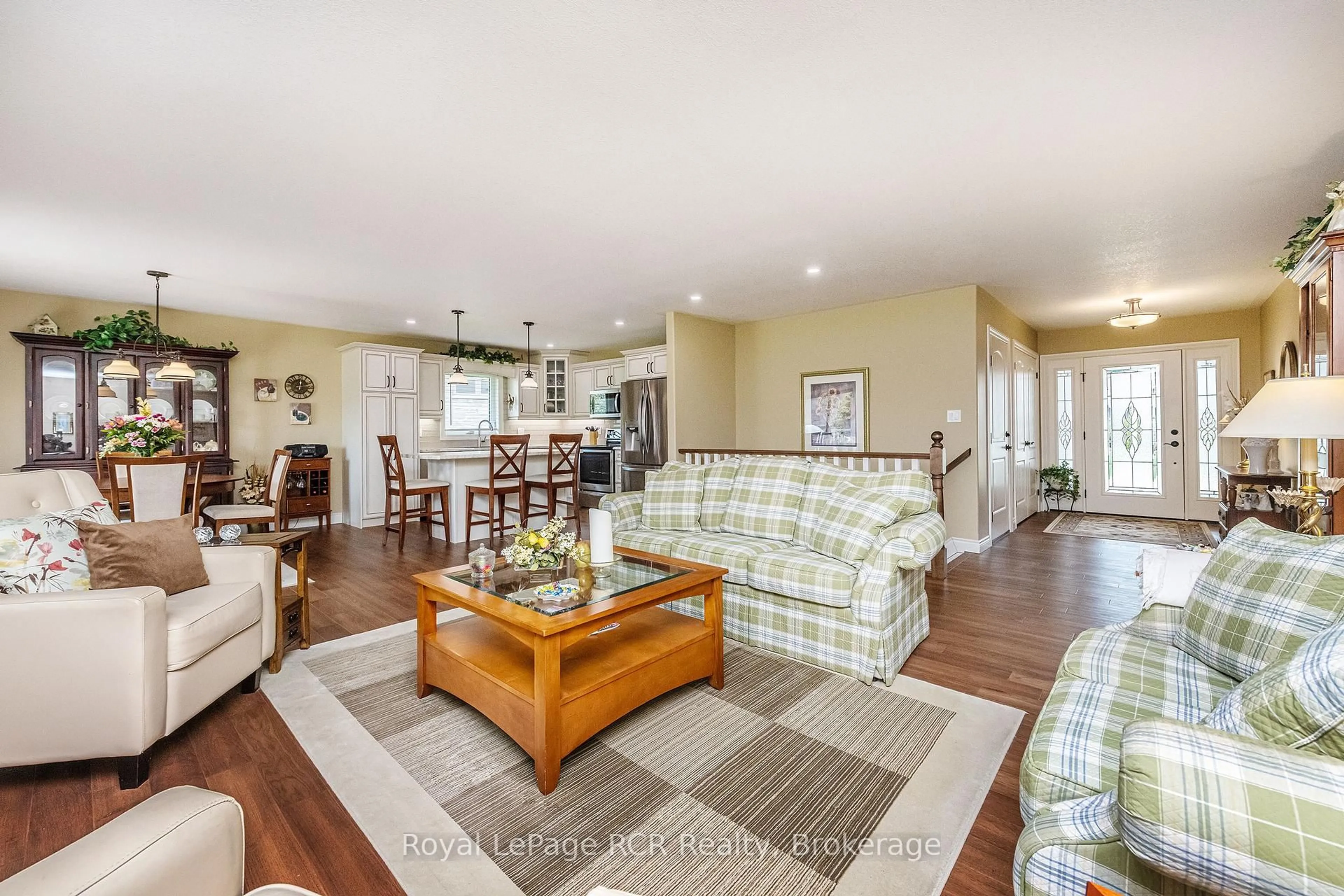 Living room with furniture, wood/laminate floor for 773 15th St, Hanover Ontario N4N 3W7