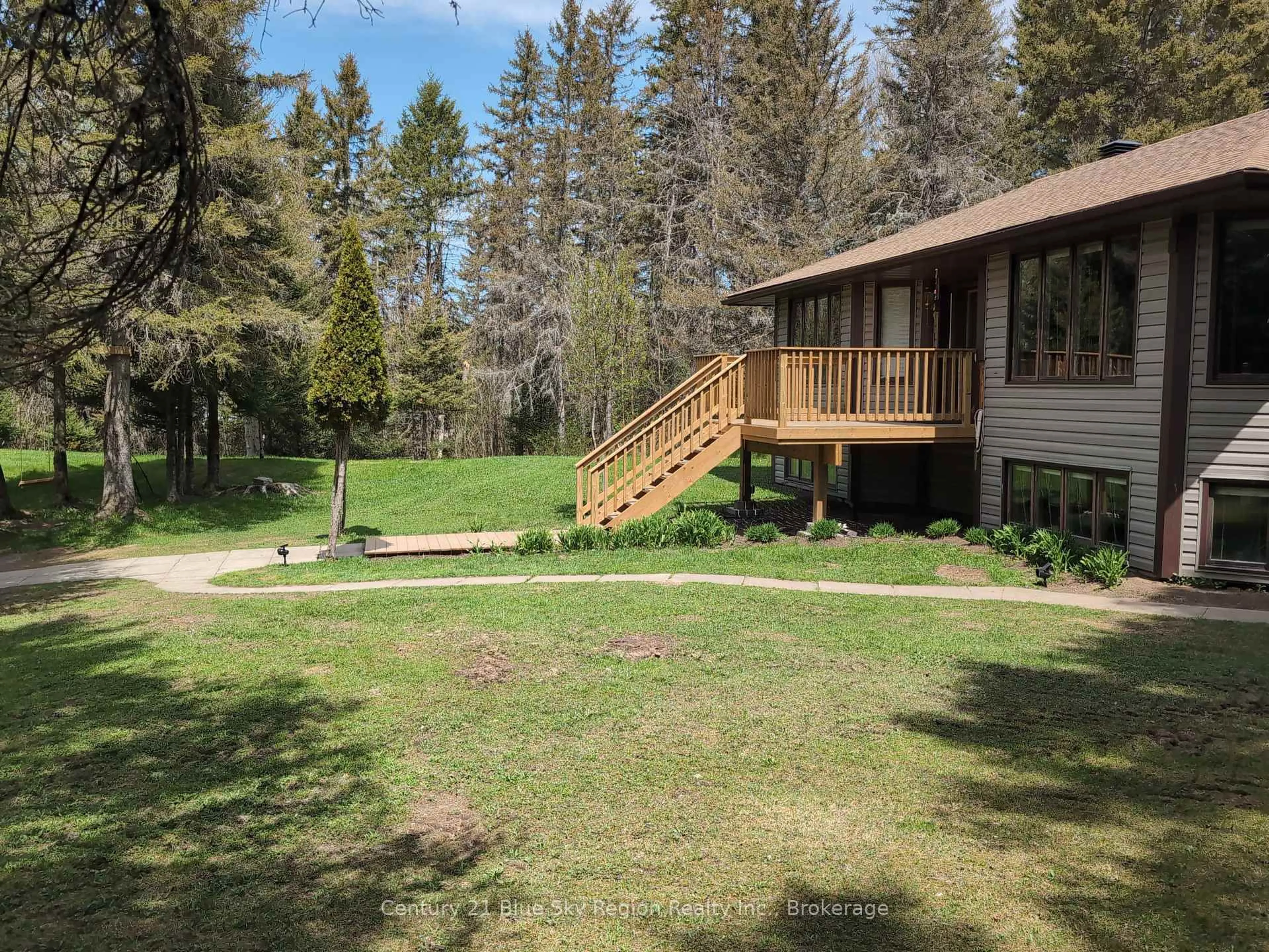 A pic from outside/outdoor area/front of a property/back of a property/a pic from drone, forest/trees view for 556 Genesee Lake Rd, Powassan Ontario P0H 1Z0