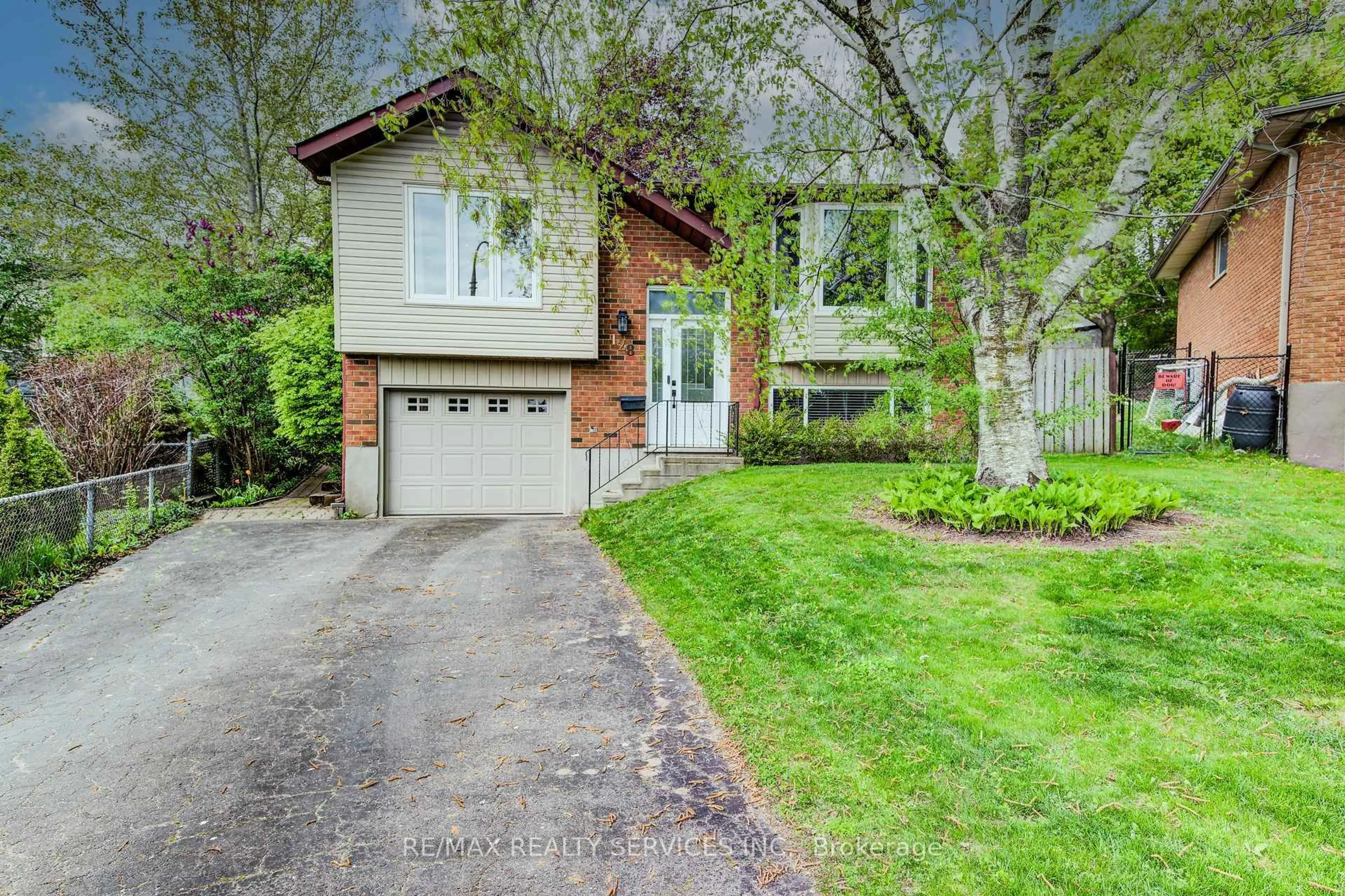 Home with brick exterior material, street for 128 Albion Crt, Kitchener Ontario N2E 2N3