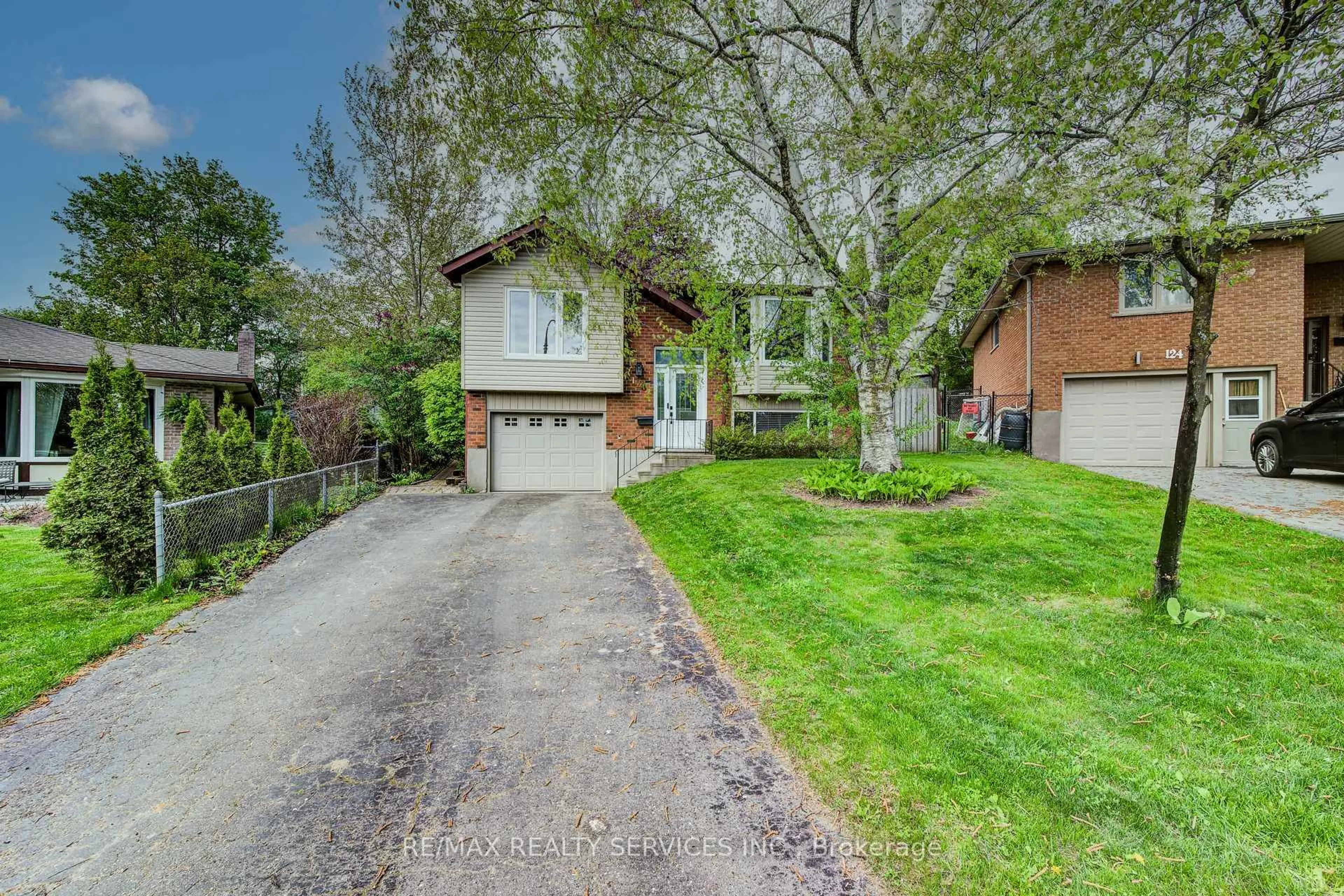 Home with brick exterior material, street for 128 Albion Crt, Kitchener Ontario N2E 2N3