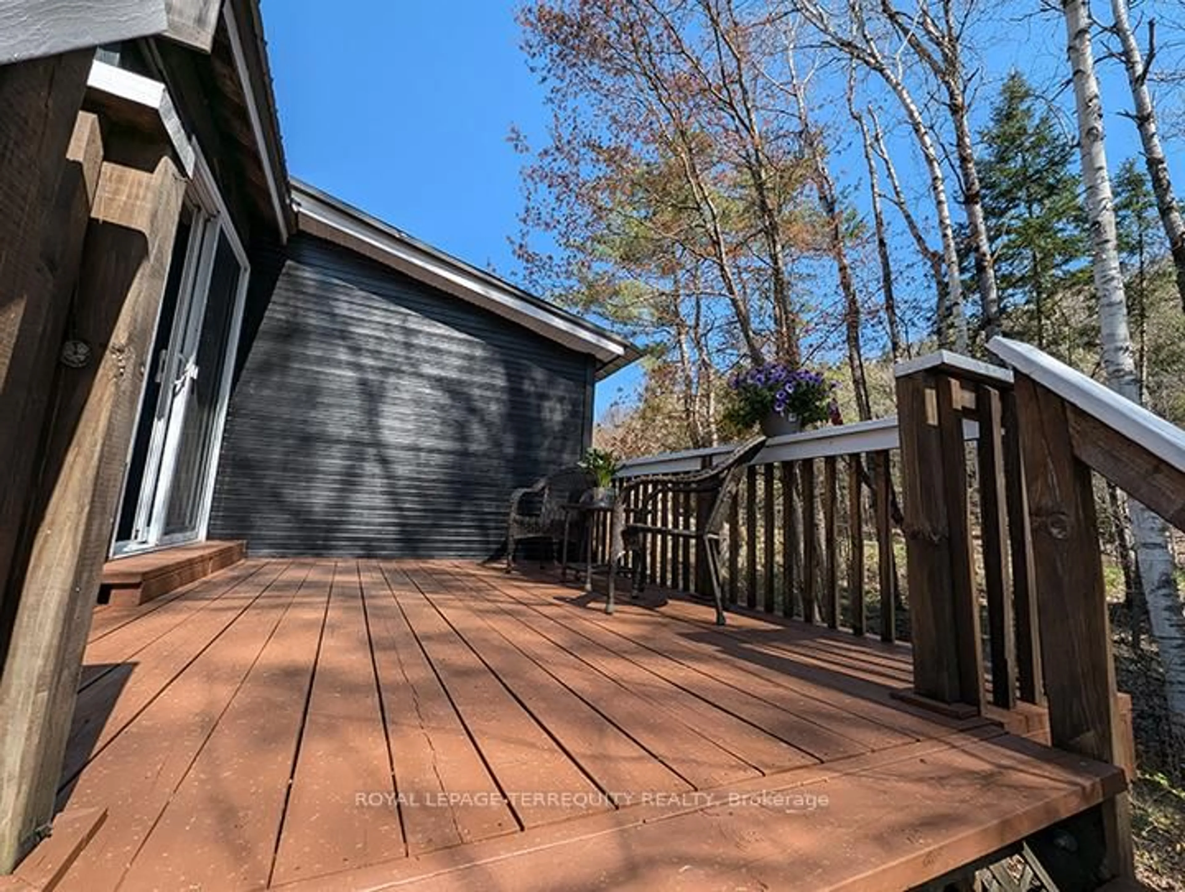Patio, forest/trees view for 1 Mount Vernon Tr #6, Huntsville Ontario P1H 1E3