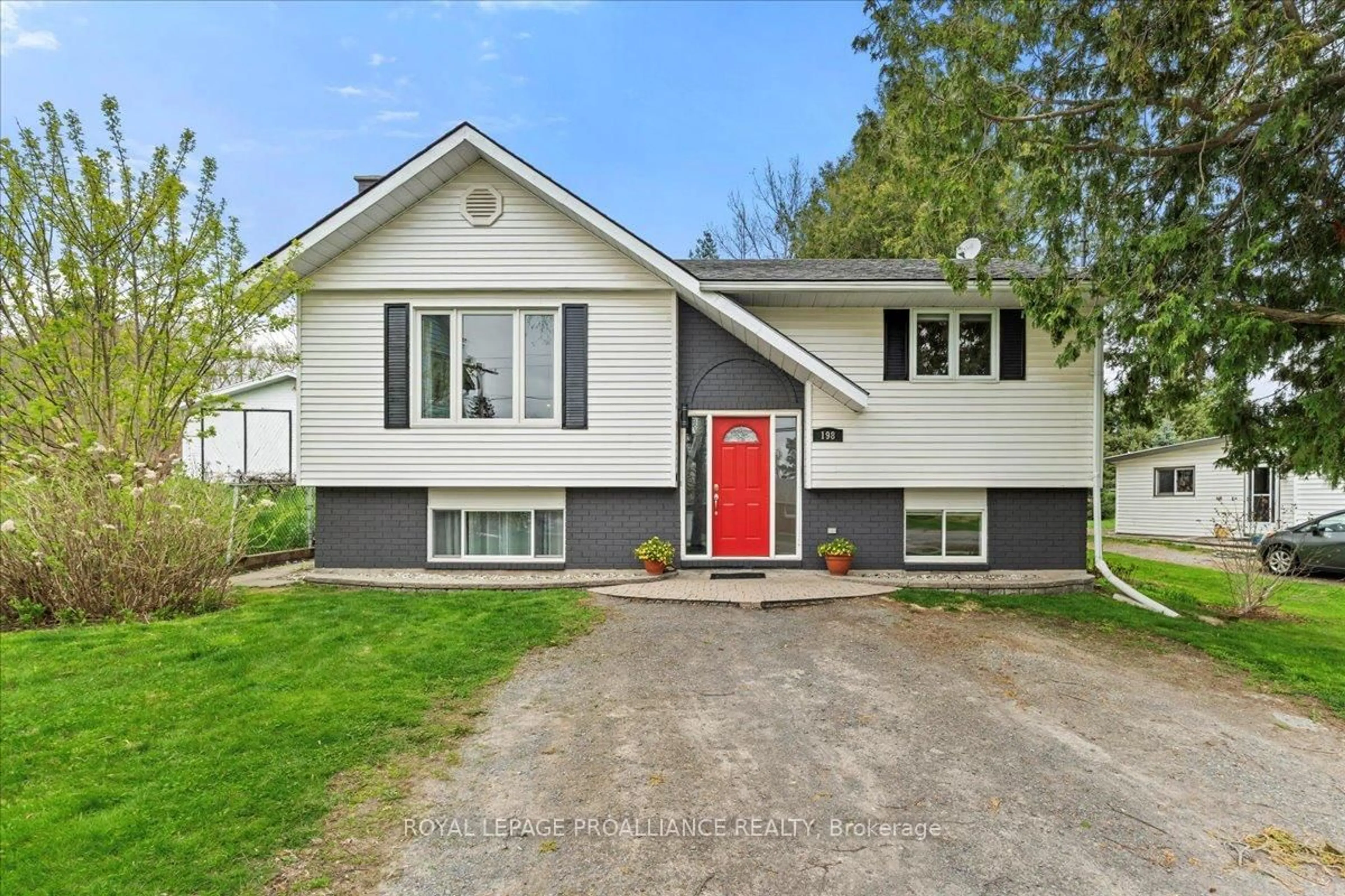 Home with vinyl exterior material, street for 198 Mill St, Stirling Ontario K0K 3E0