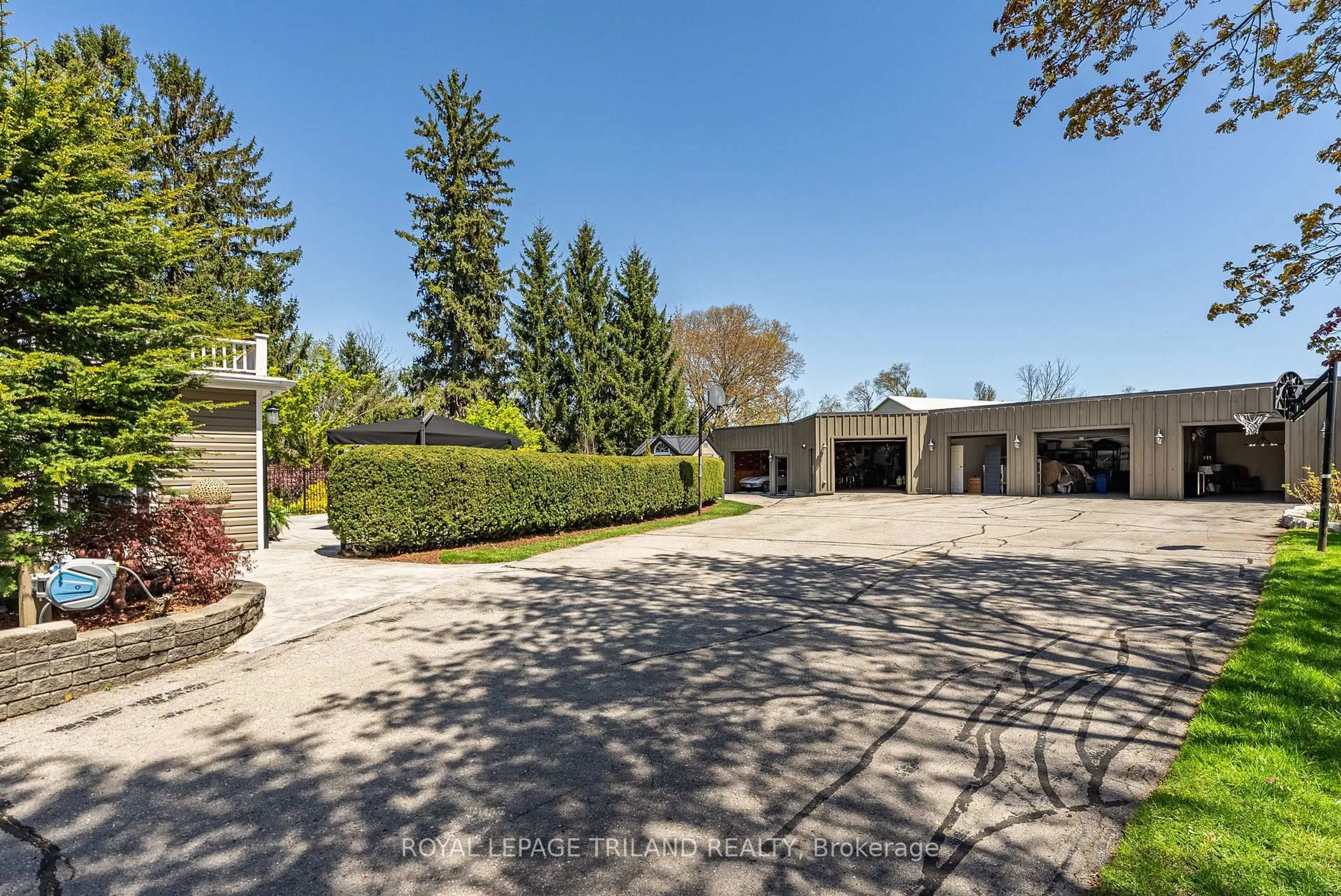 A pic from outside/outdoor area/front of a property/back of a property/a pic from drone, street for 6058 STONE CHURCH Rd, Central Elgin Ontario N0L 2L0