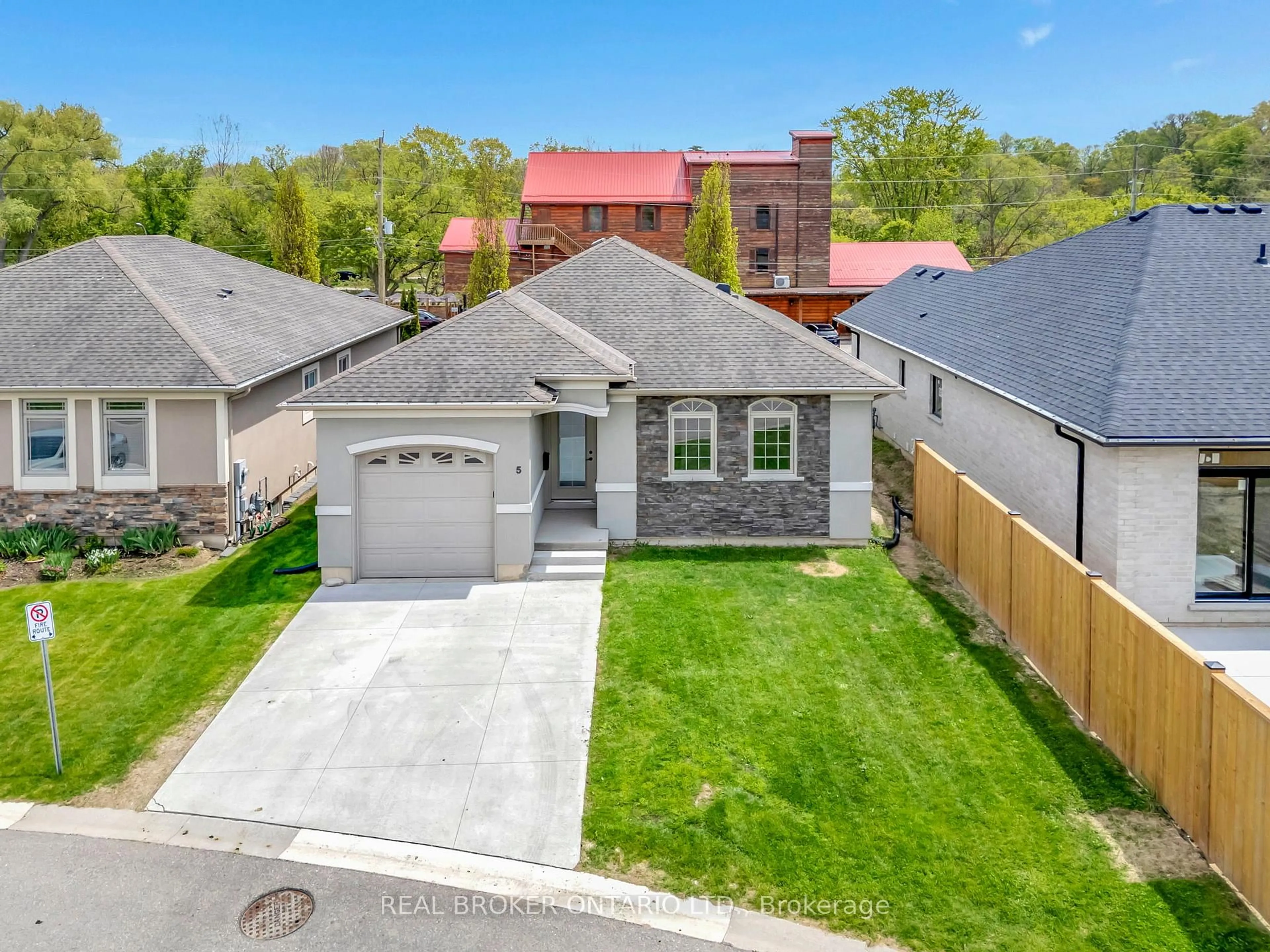 A pic from outside/outdoor area/front of a property/back of a property/a pic from drone, street for 5 John Pound Rd #5, Tillsonburg Ontario N4G 5X3