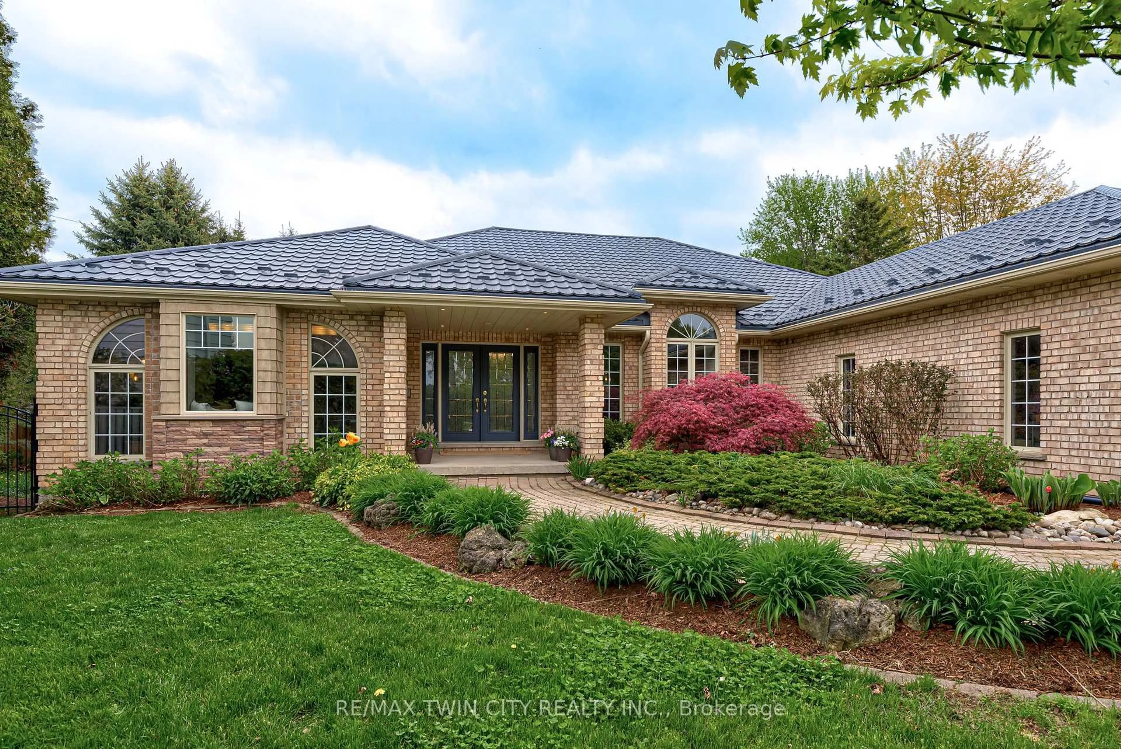 Home with brick exterior material, street for 247 Montclair Pl, Waterloo Ontario N2J 3L7