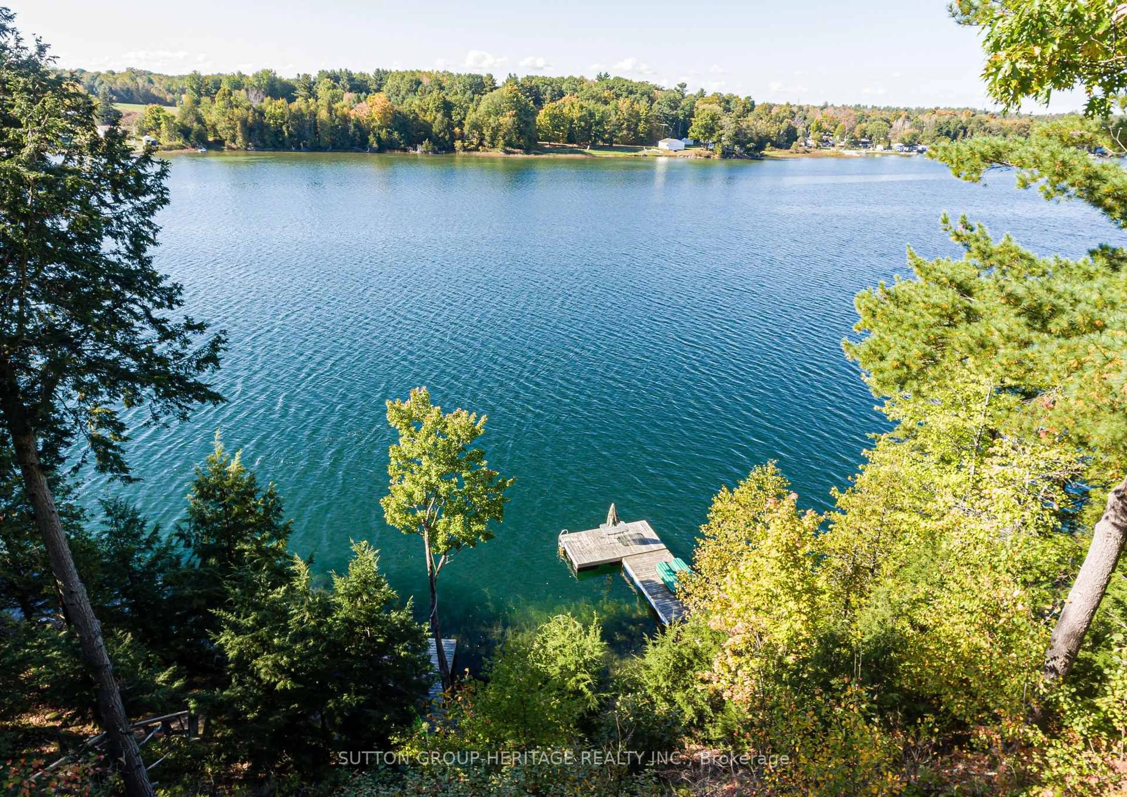 A pic from outside/outdoor area/front of a property/back of a property/a pic from drone, water/lake/river/ocean view for 250 Younge Lane, Godfrey Ontario K0H 1T0