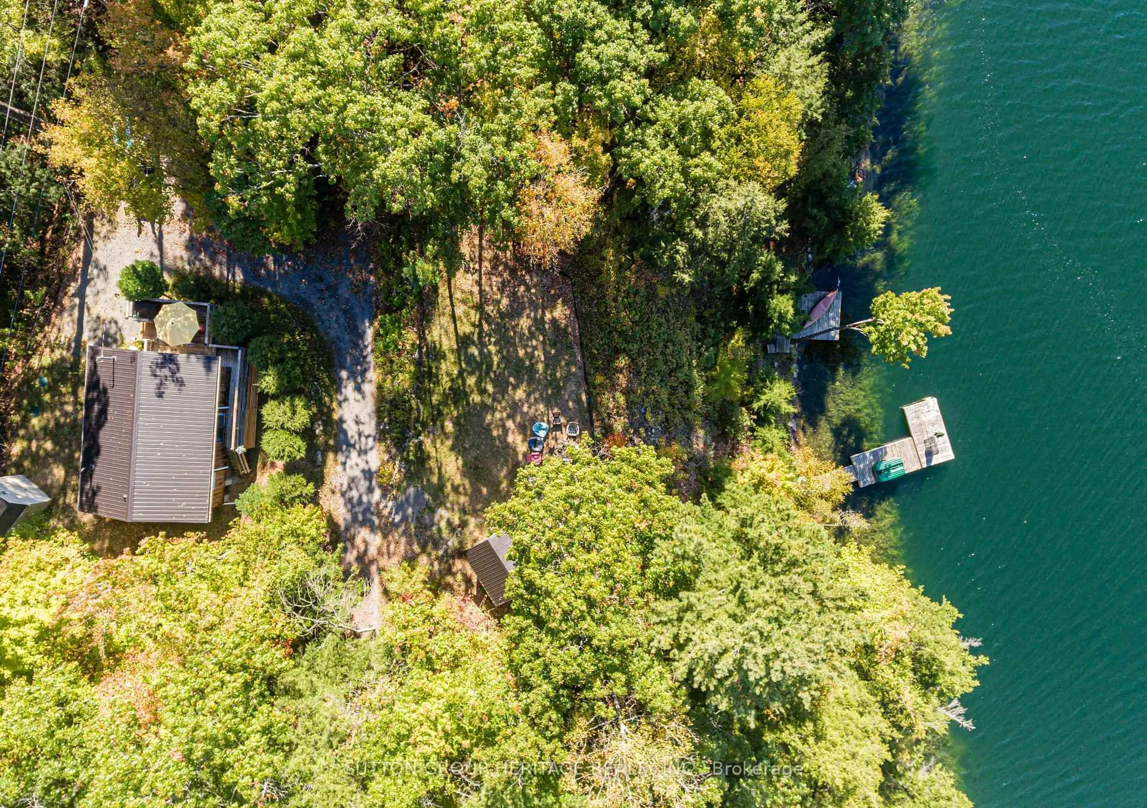 A pic from outside/outdoor area/front of a property/back of a property/a pic from drone, water/lake/river/ocean view for 250 Younge Lane, Godfrey Ontario K0H 1T0