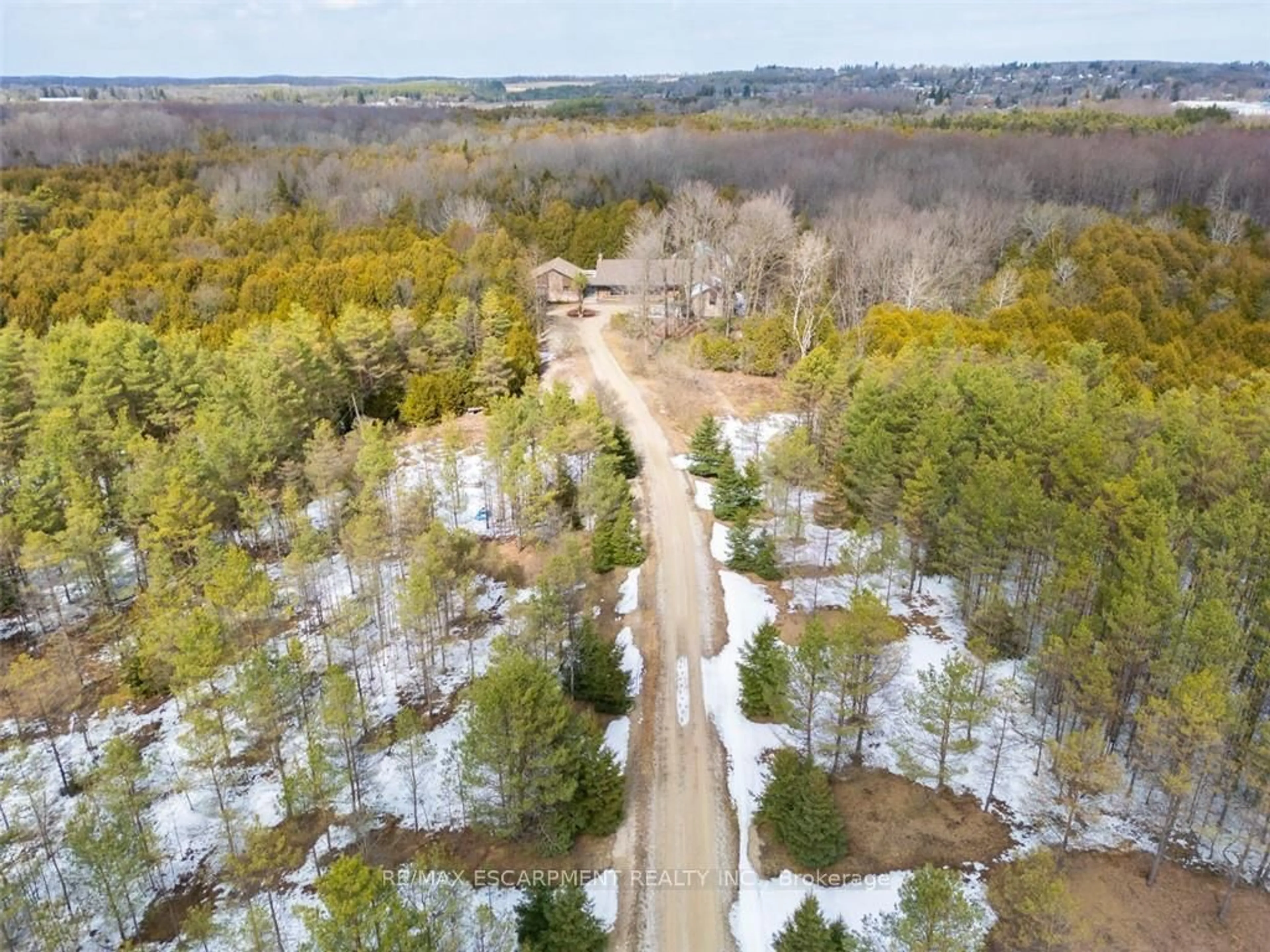 A pic from outside/outdoor area/front of a property/back of a property/a pic from drone, forest/trees view for 302783 Douglas St, West Grey Ontario N0G 1R0