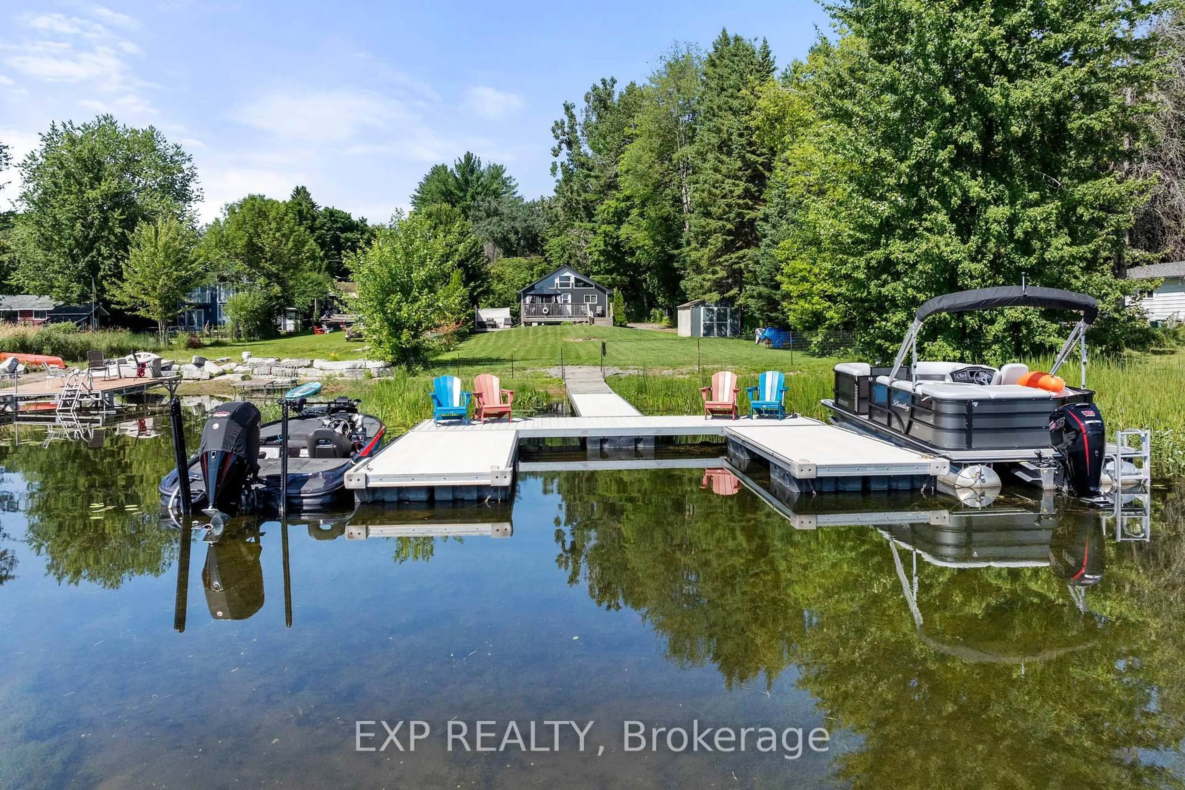 A pic from outside/outdoor area/front of a property/back of a property/a pic from drone, water/lake/river/ocean view for 104 Fulsom Cres, Kawartha Lakes Ontario L0K 1W0