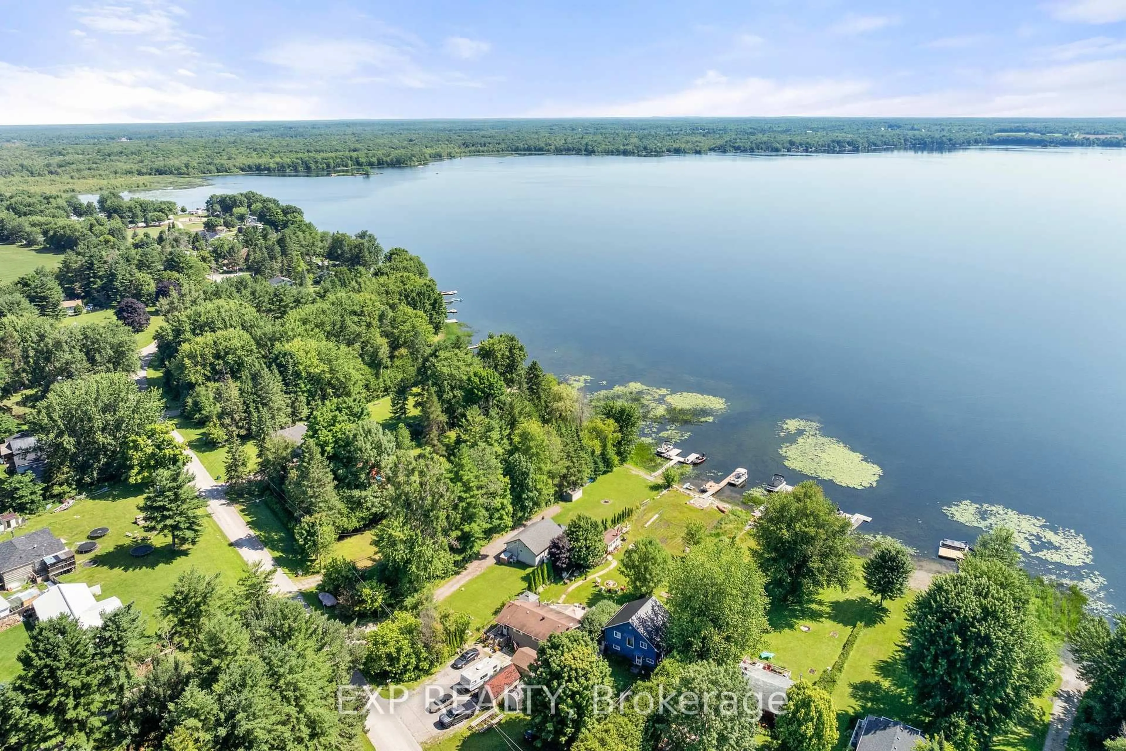 A pic from outside/outdoor area/front of a property/back of a property/a pic from drone, water/lake/river/ocean view for 104 Fulsom Cres, Kawartha Lakes Ontario L0K 1W0