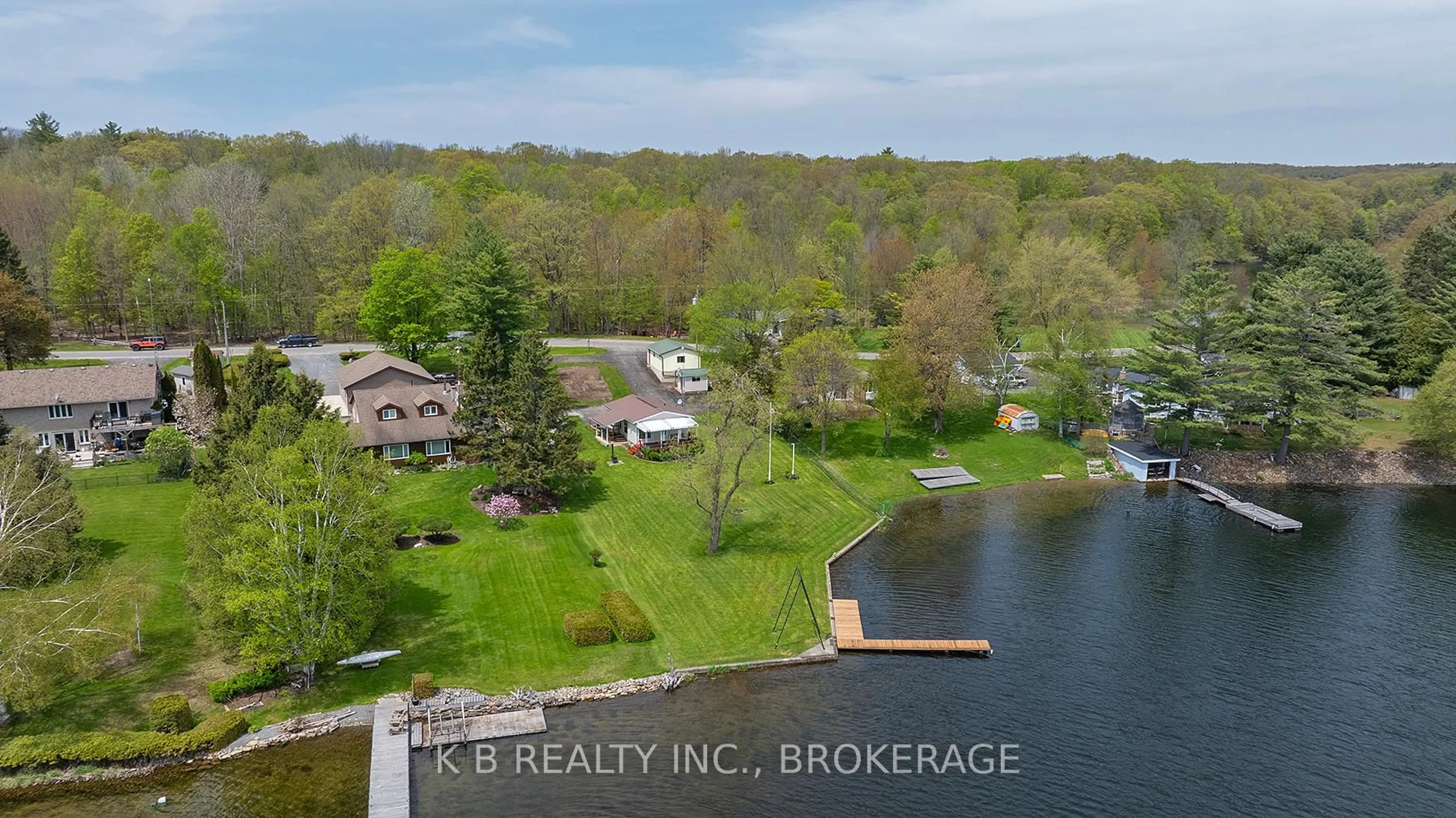 A pic from outside/outdoor area/front of a property/back of a property/a pic from drone, water/lake/river/ocean view for 5374 Rideau Rd, Seeley's Bay Ontario K0H 2N0