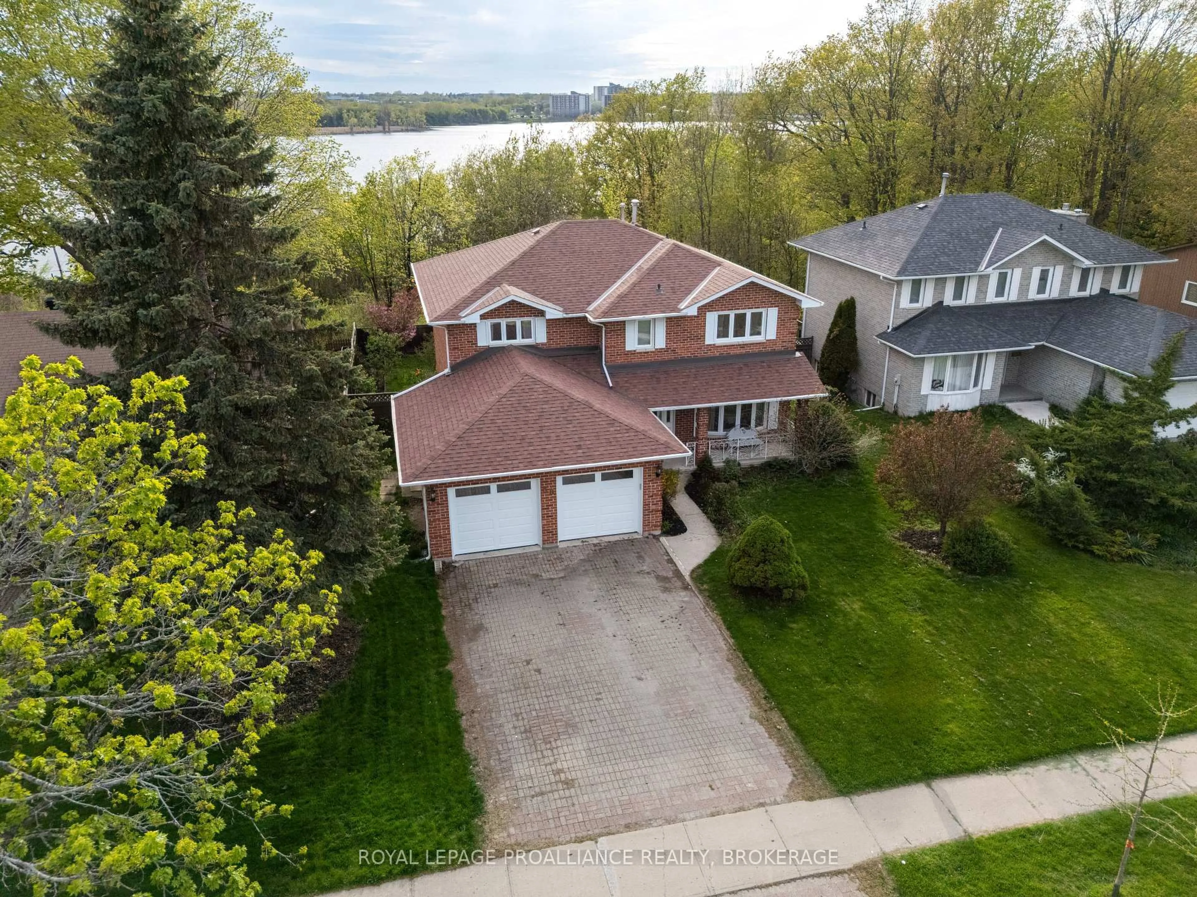A pic from outside/outdoor area/front of a property/back of a property/a pic from drone, water/lake/river/ocean view for 60 Point St. Mark Dr, Kingston Ontario K7K 6L8