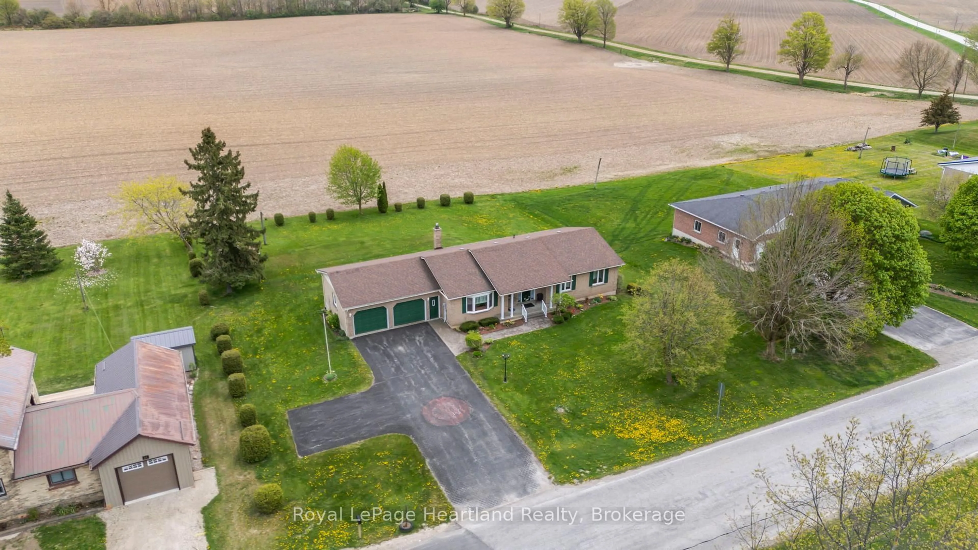 A pic from outside/outdoor area/front of a property/back of a property/a pic from drone, street for 73 Allan St, Minto Ontario N0G 1M0