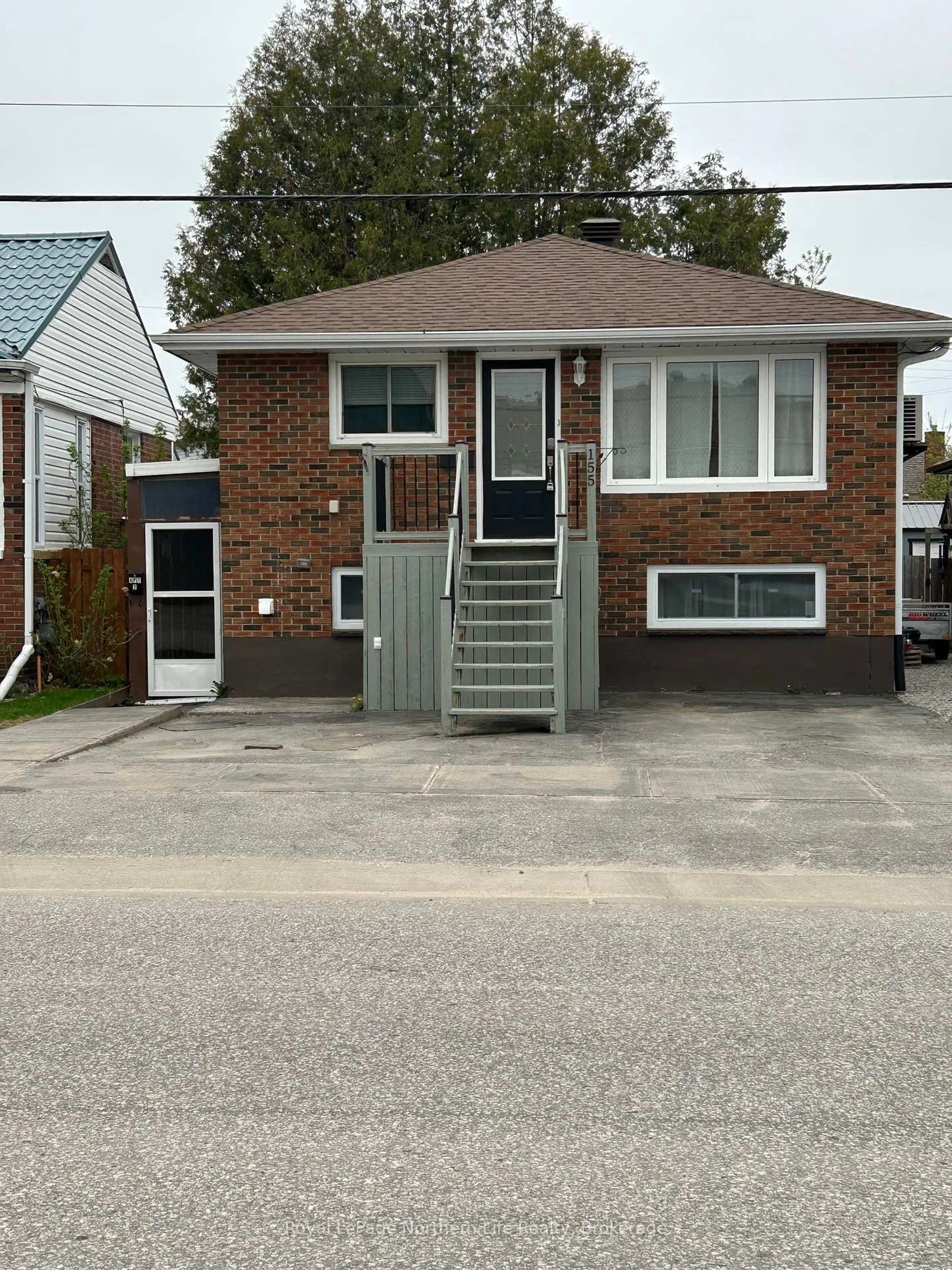 Home with brick exterior material, street for 155 King St, North Bay Ontario P1B 1P1