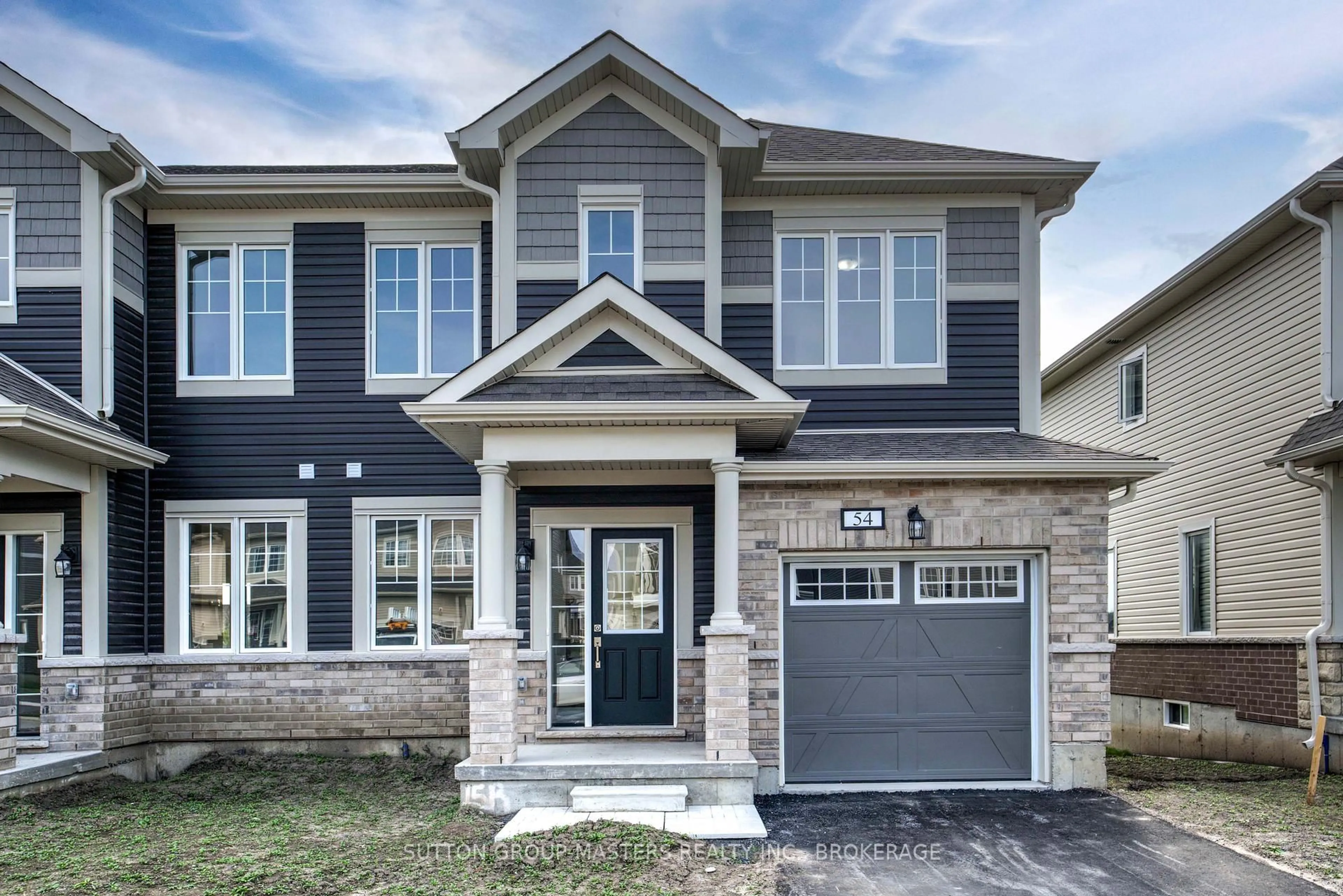 Home with brick exterior material, street for 54 Golf Links Dr, Bath Ontario K0H 1G0
