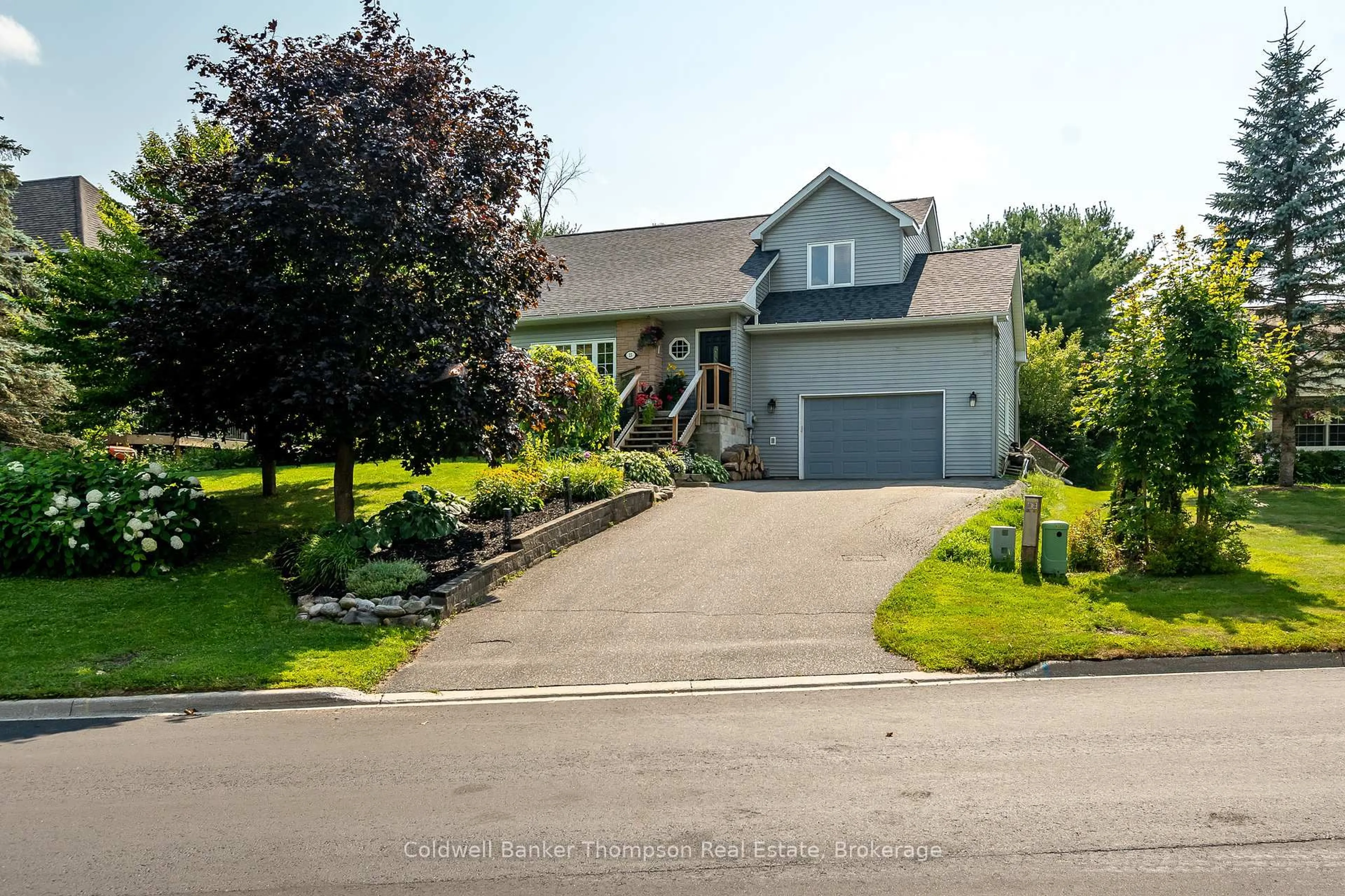 A pic from outside/outdoor area/front of a property/back of a property/a pic from drone, street for 15 COVERED BRIDGE Tr, Bracebridge Ontario P1L 1Y1