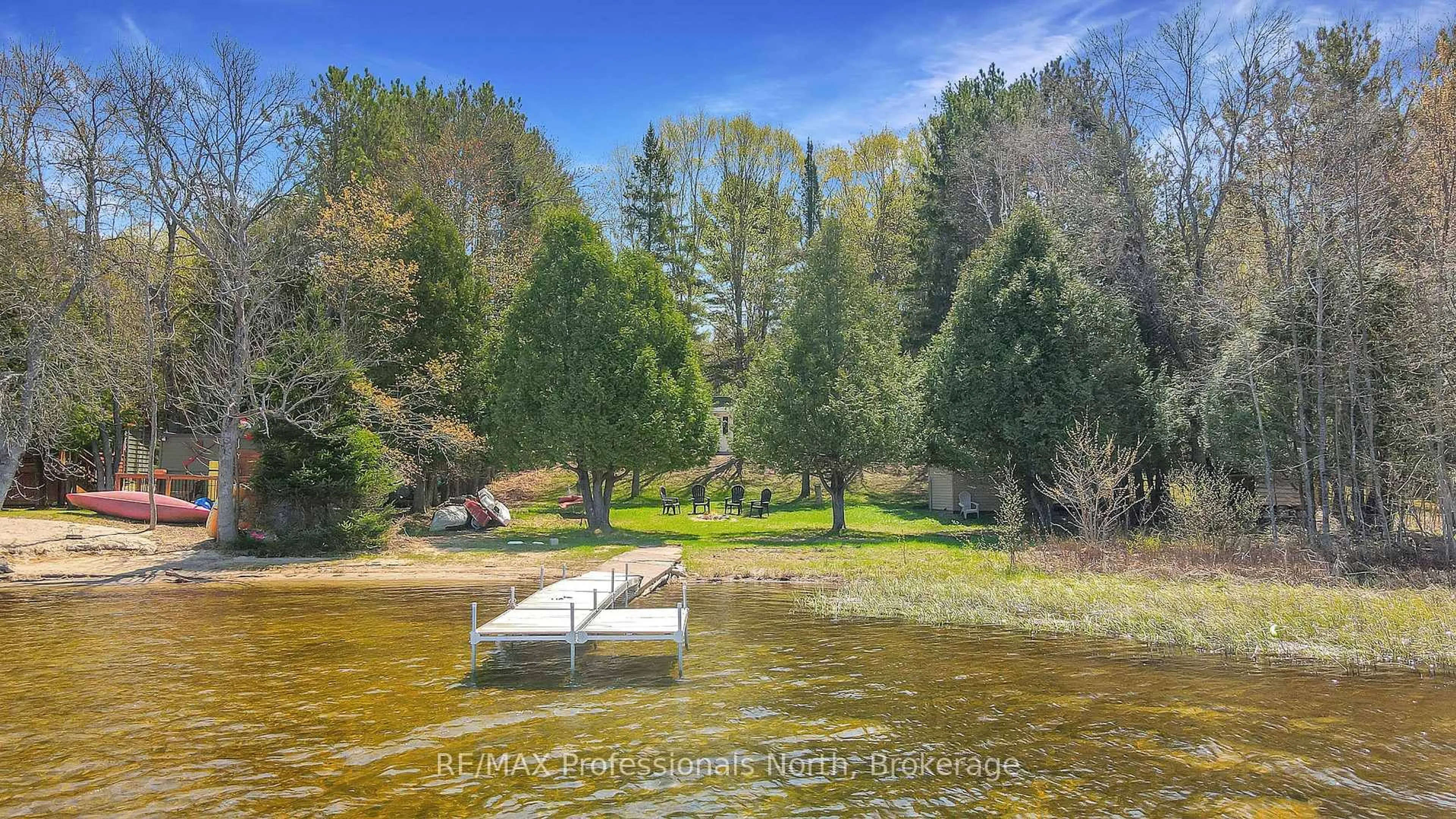 A pic from outside/outdoor area/front of a property/back of a property/a pic from drone, water/lake/river/ocean view for 1130 Fader Dr, Algonquin Highlands Ontario K0M 1S0