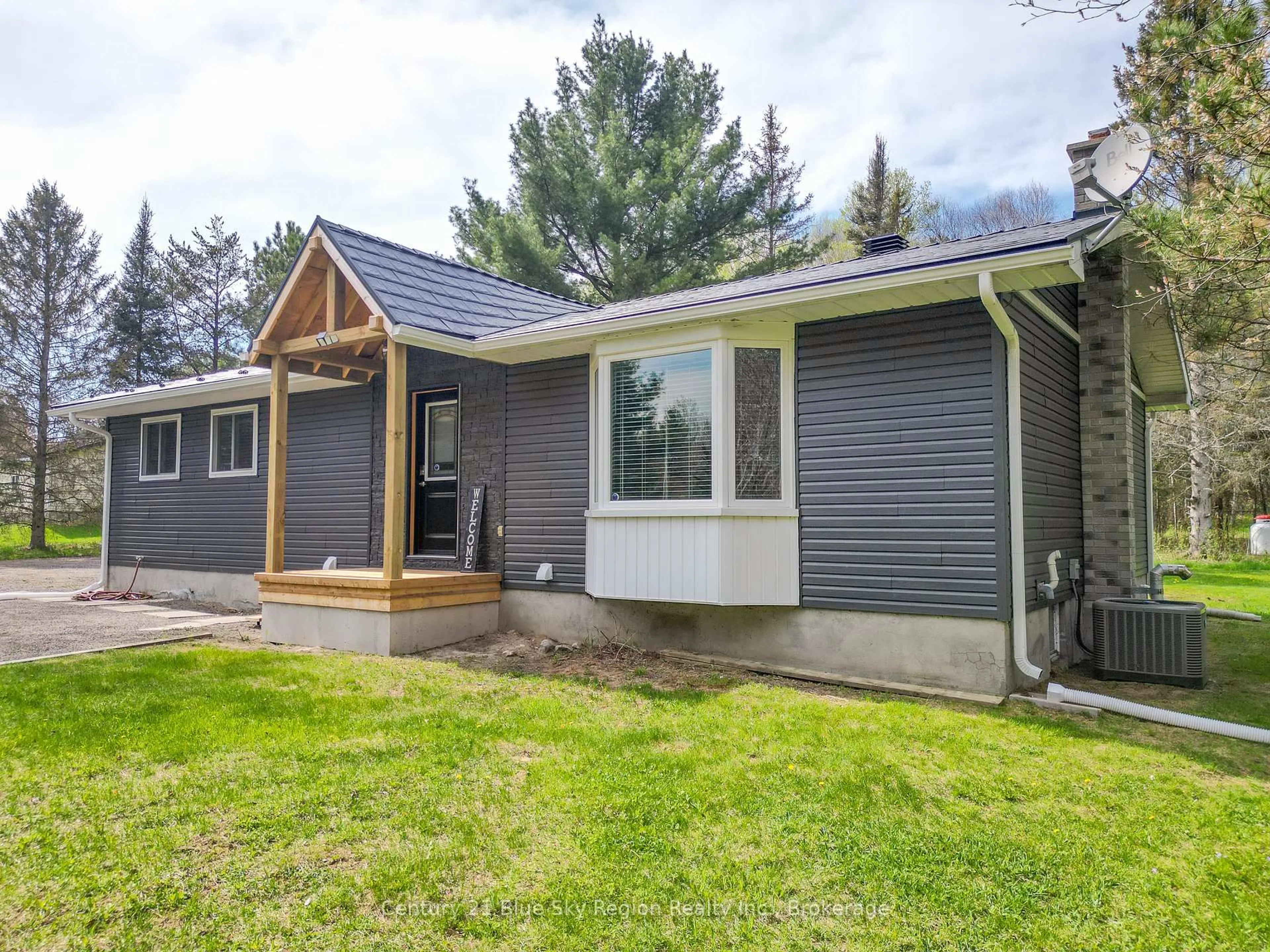 Home with vinyl exterior material, street for 133 South Shore Rd, East Ferris Ontario P0H 1B0